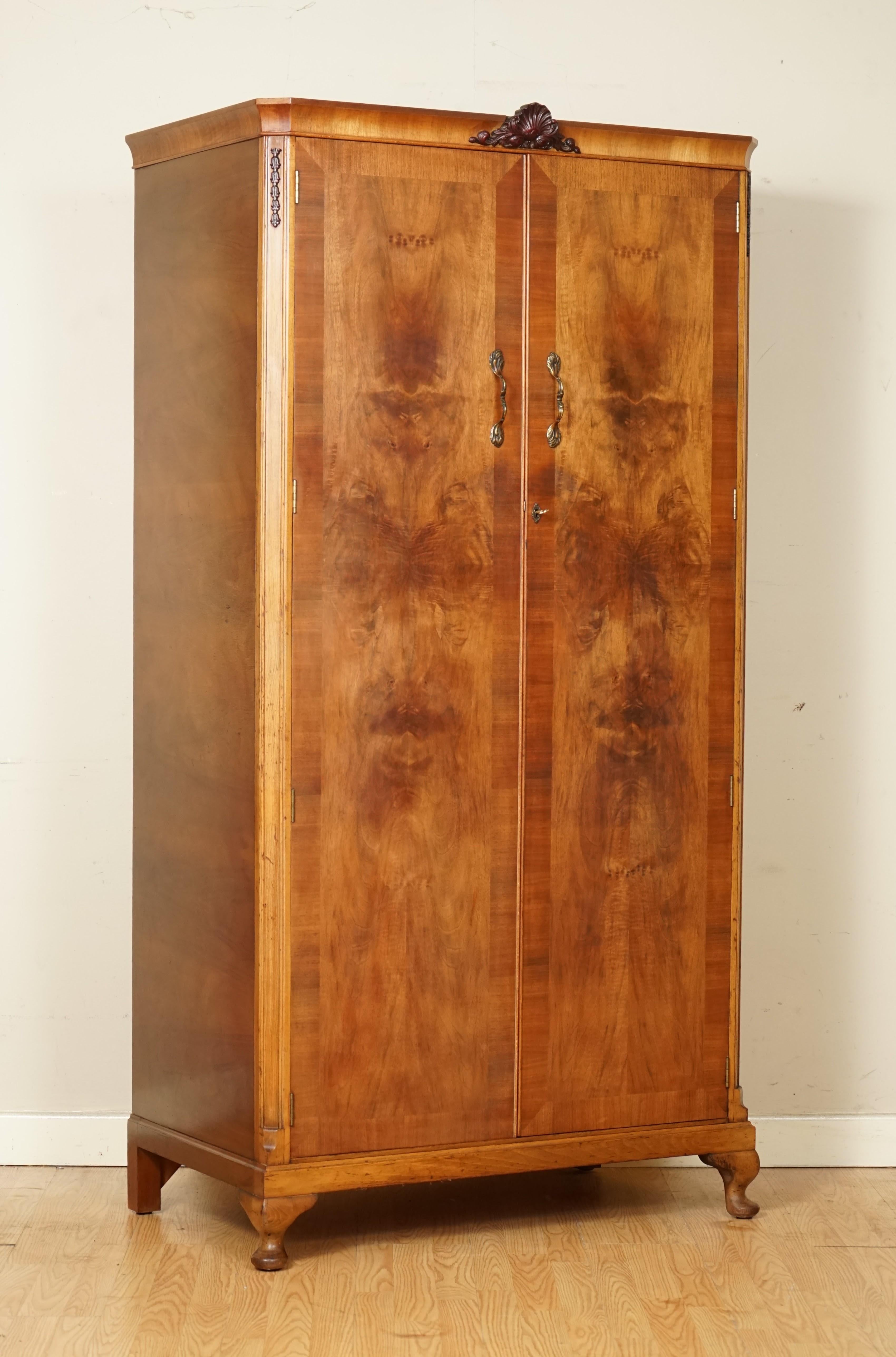 We are so excited to present to you this beautiful Art Deco burr walnut wardrobe.

A lovely and decorative wardrobe, inside you will find a rail to hang your clothes as well as a shelve above and shelves on the right side. 

Please carefully