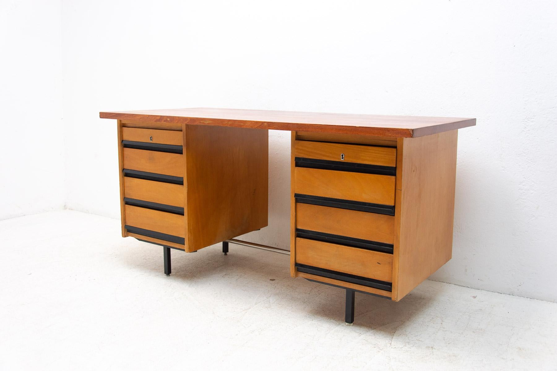 This Vintage writing desk was made in the former Czechoslovakia in the 1970´s.

It's made of beech wood with iron legs. Plastic drawers.

Very simple design. In good vintage condition, showing signs of age and using( few small scratches