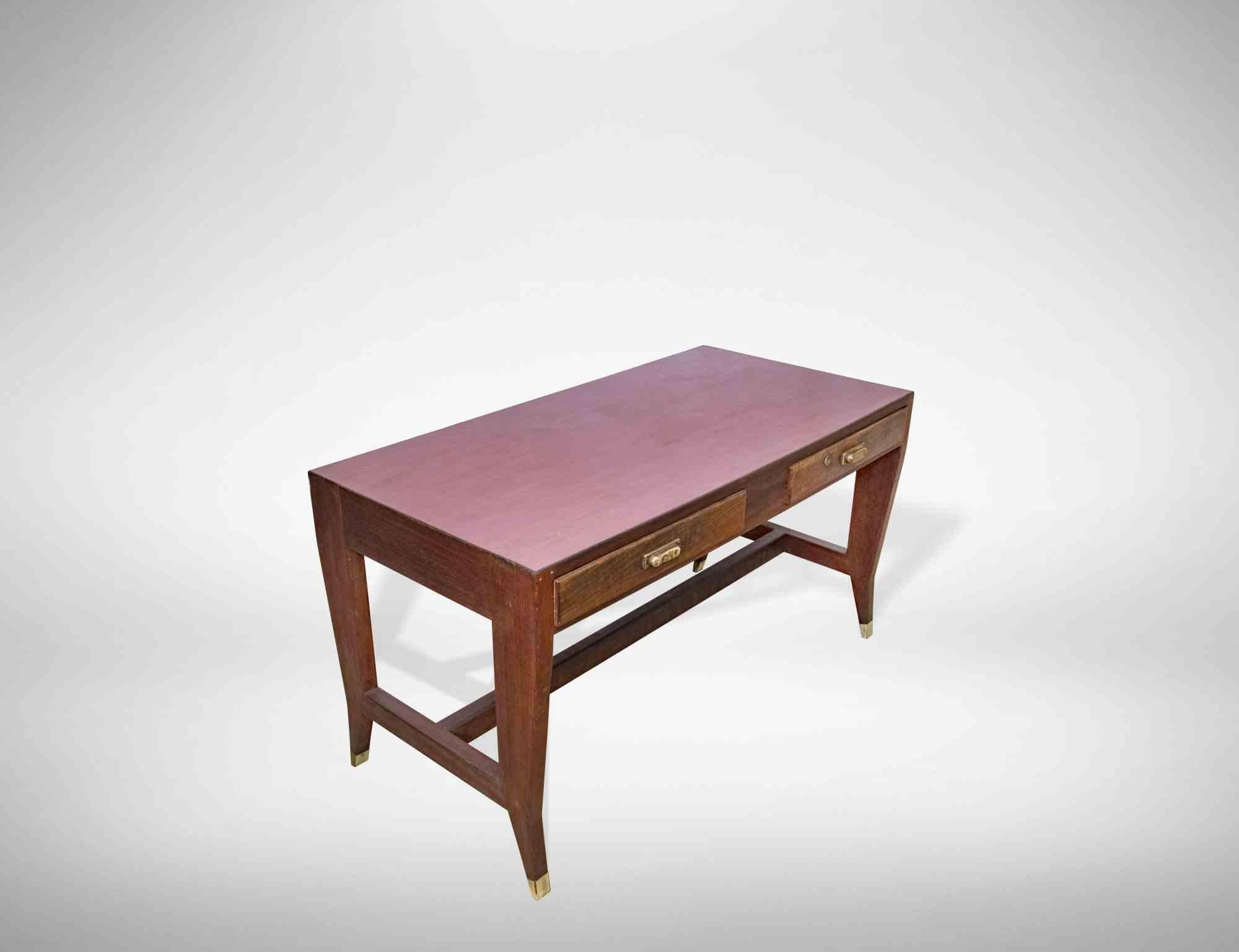 Vintage Writing Desk is an original design item realized in the 1950s by Gio Ponti for Schirolli.

Realized by Gio Ponti and produced by Schirolli for BNL (Banca Nazionale del Lavoro) in the 1950s.

Walnut with formica table and brass