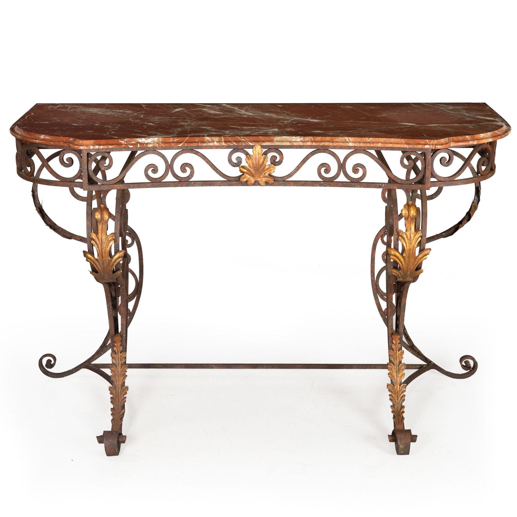 GILT AND PATINATED WROUGHT IRON CONSOLE WITH ROUGE MARBLE TOP
20th Century
Item # 304LNP24P 

A nice mid-to-late 20th century wrought iron console, it features a lovely rouge marble top with wonderful veining throughout and a thumb-molded edge. The