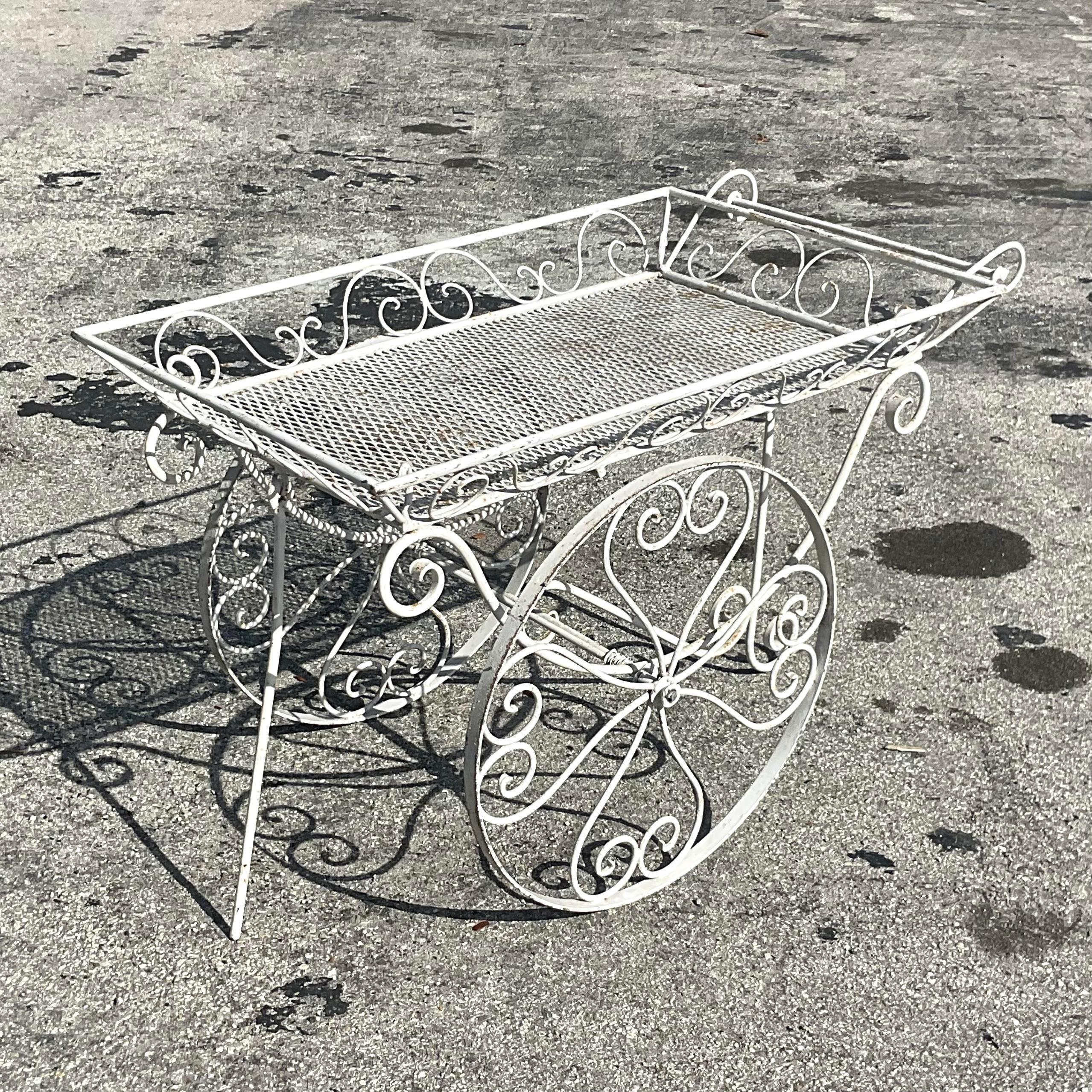 vintage wrought iron flower cart