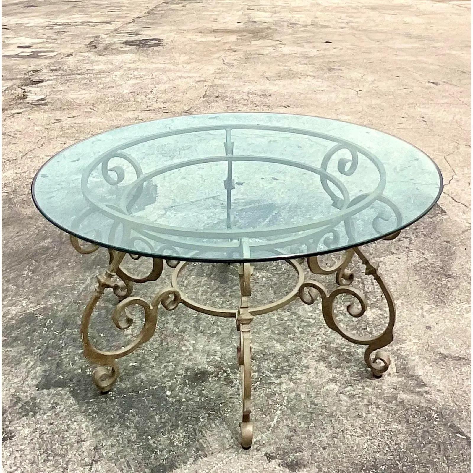Fantastic vintage wrought iron dining table. Beautiful large table that is perfect indoors or outside in a covered area. Acquired from a Palm Beach estate.