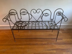 Vintage Wrought Iron Faces Patio Bench or Outdoor Settee