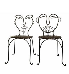 Vintage Wrought Iron Face Stools in the mode of John Risley