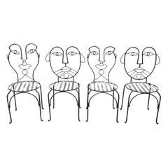 Vintage Wrought Iron Face Stools in the mode of John Risley