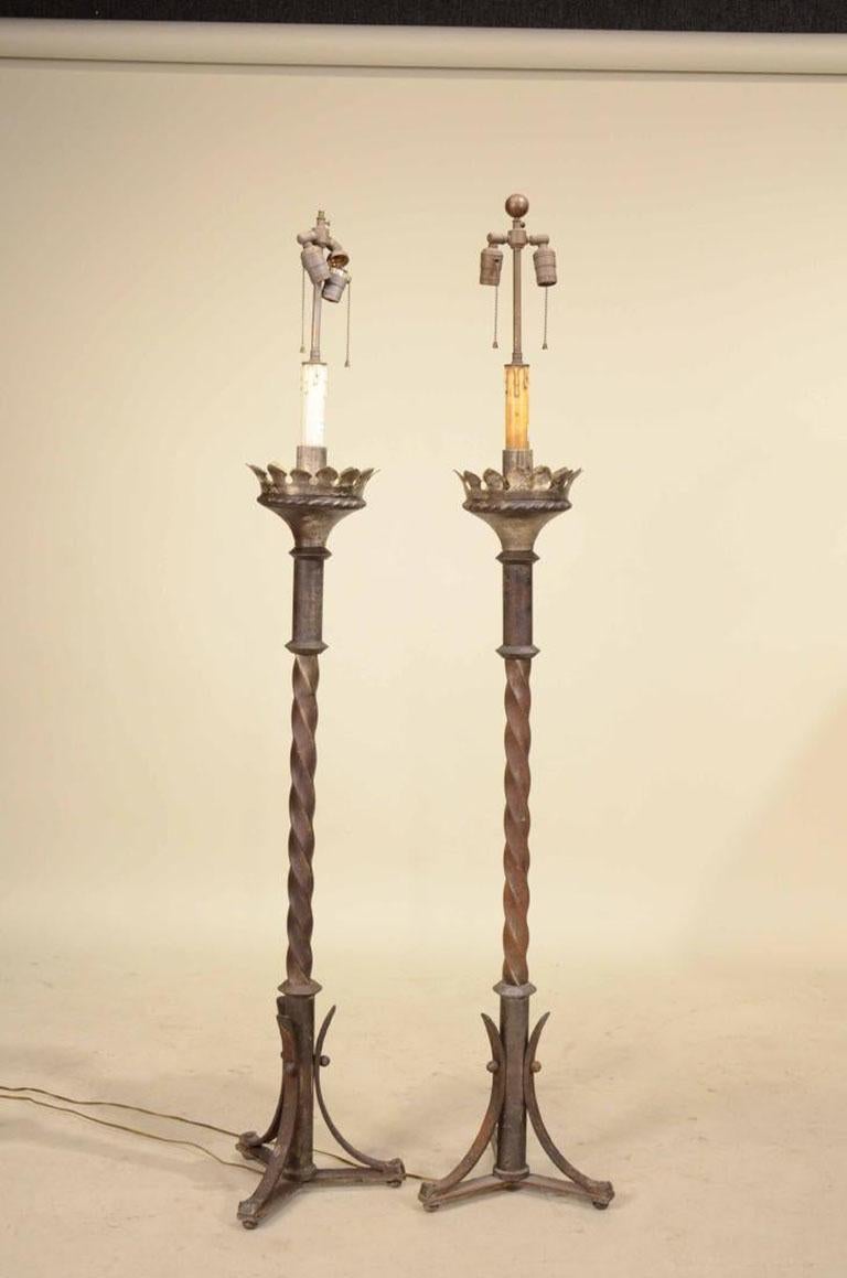 A lovely pair of wrought iron floor lamps - suitable for the living room, den, office or bedroom. A compliment to modern and traditional spaces, this lovely pair of vintage wrought floor lamps are in good condition and perfect for any space to add
