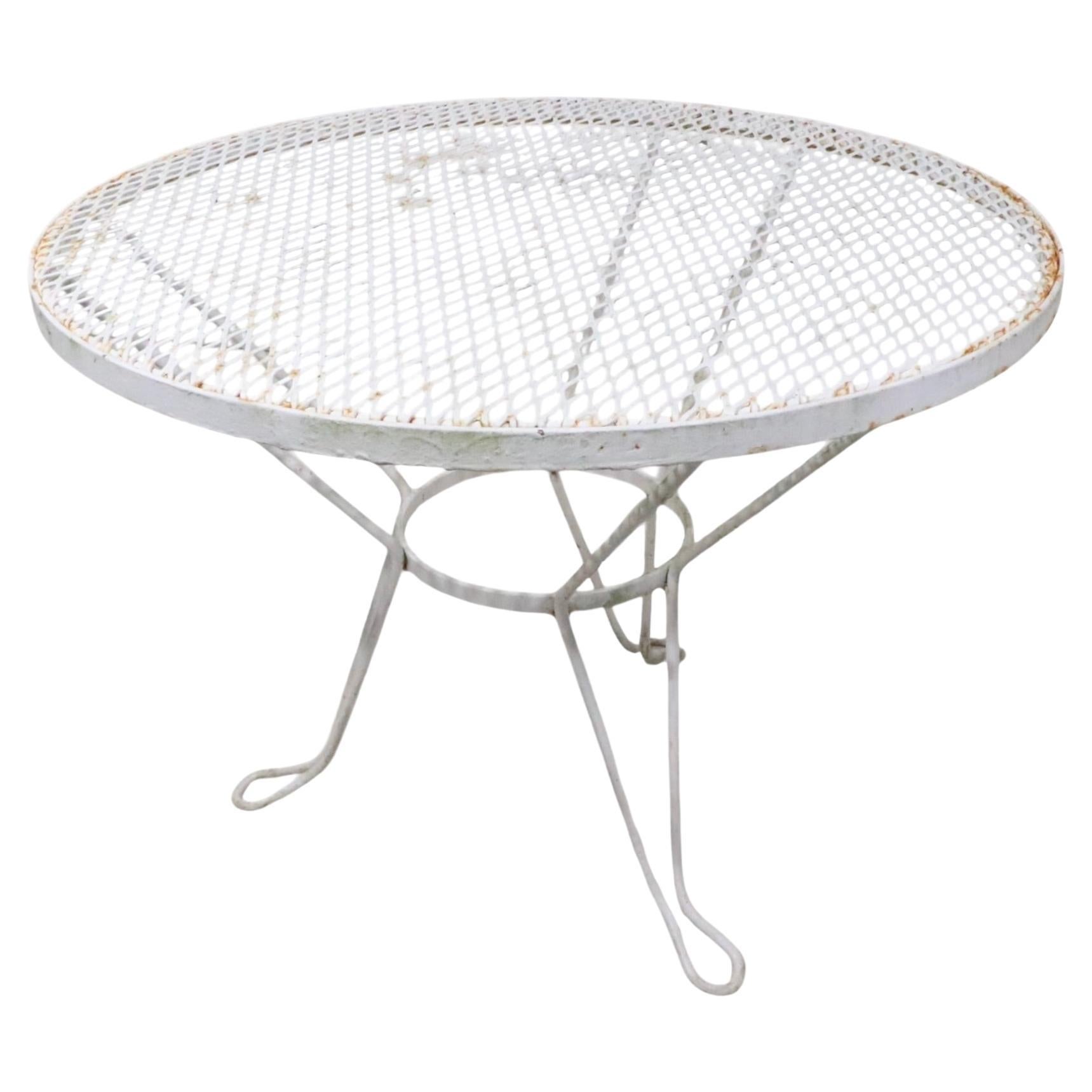 Tavolino da giardino in ferro battuto da piscina d
epoca, anni
50/
60 circa