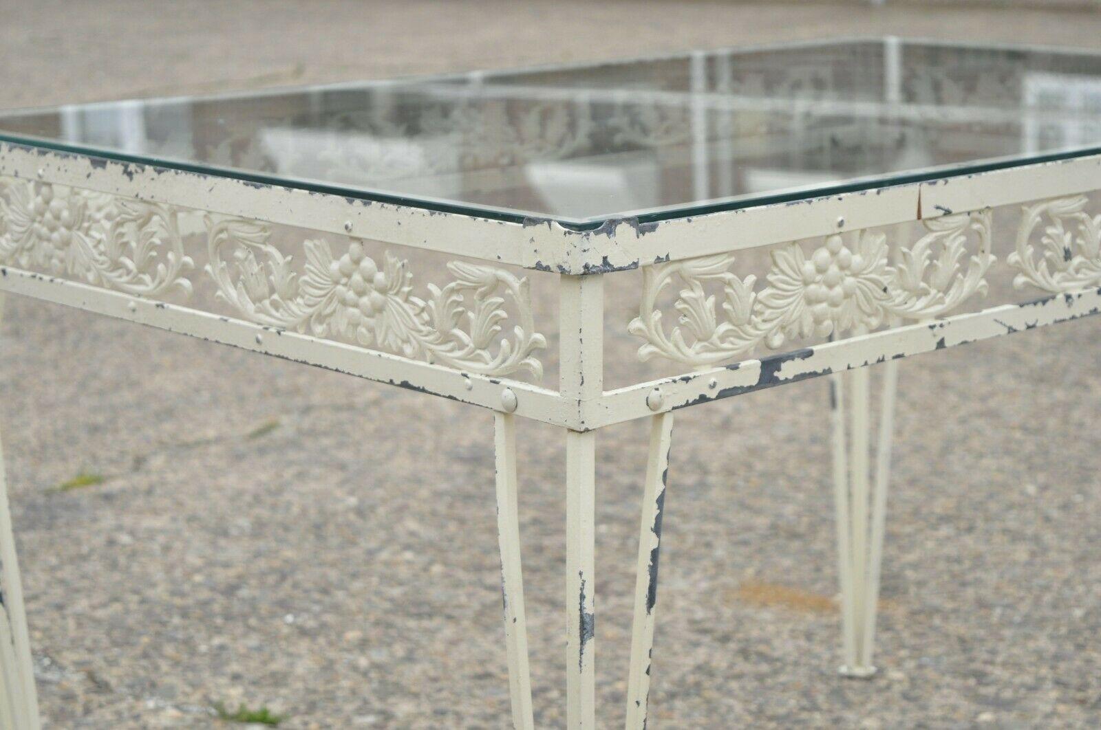 vintage wrought iron glass top table and chairs