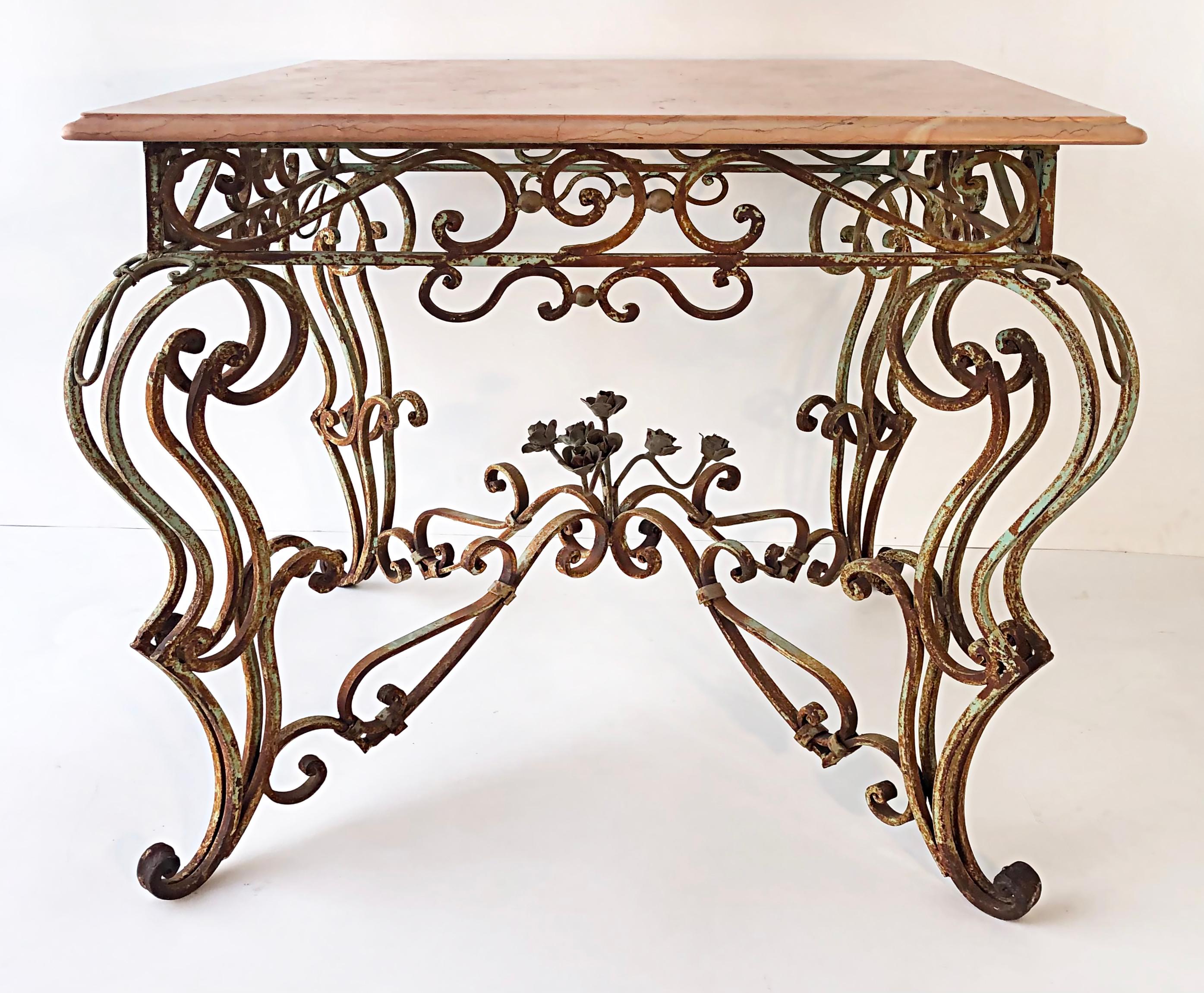 Painted Vintage Wrought Iron Marble Top Garden Table with Scrollwork and Flowers For Sale