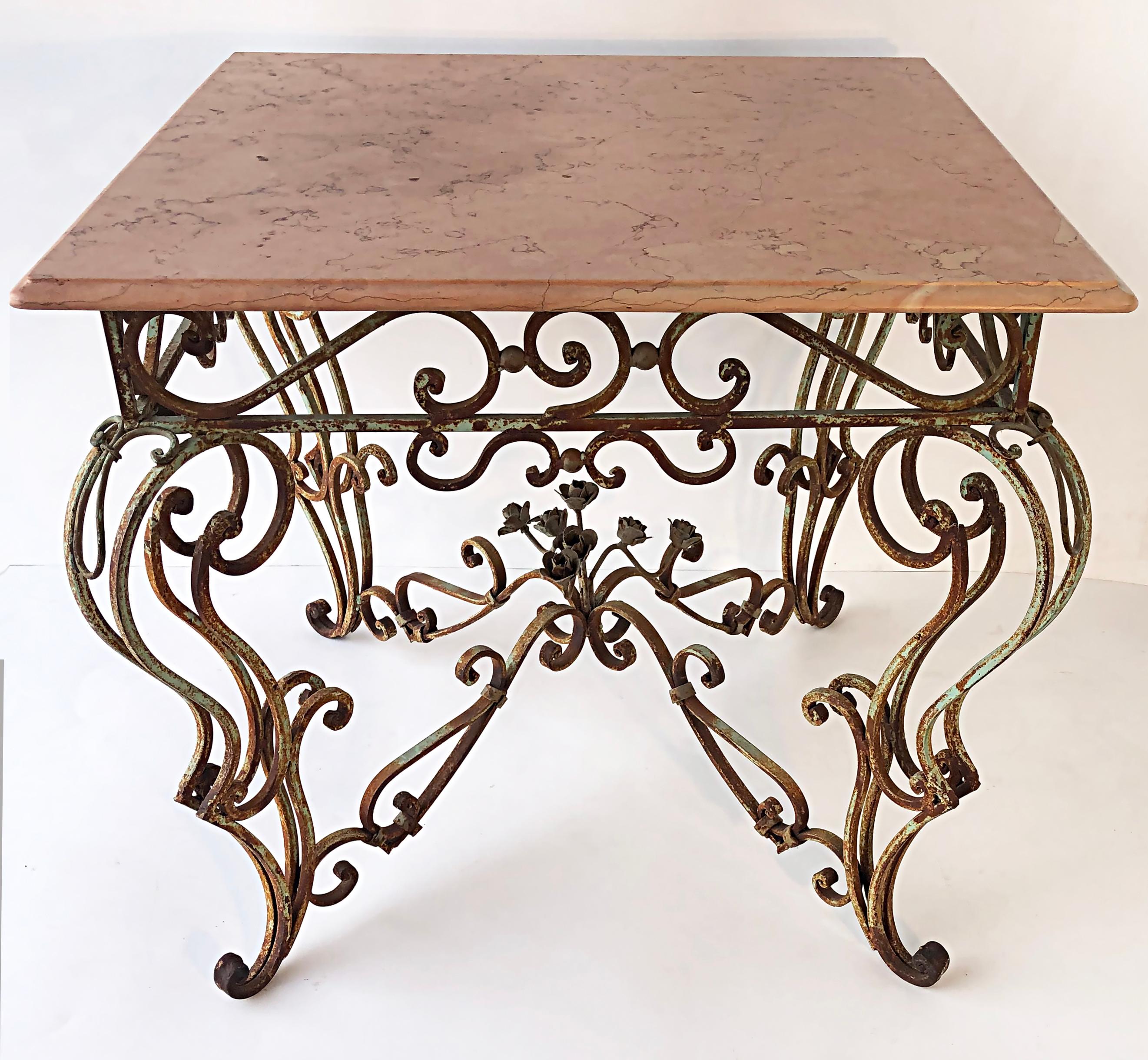 Vintage Wrought Iron Marble Top Garden Table with Scrollwork and Flowers In Good Condition For Sale In Miami, FL