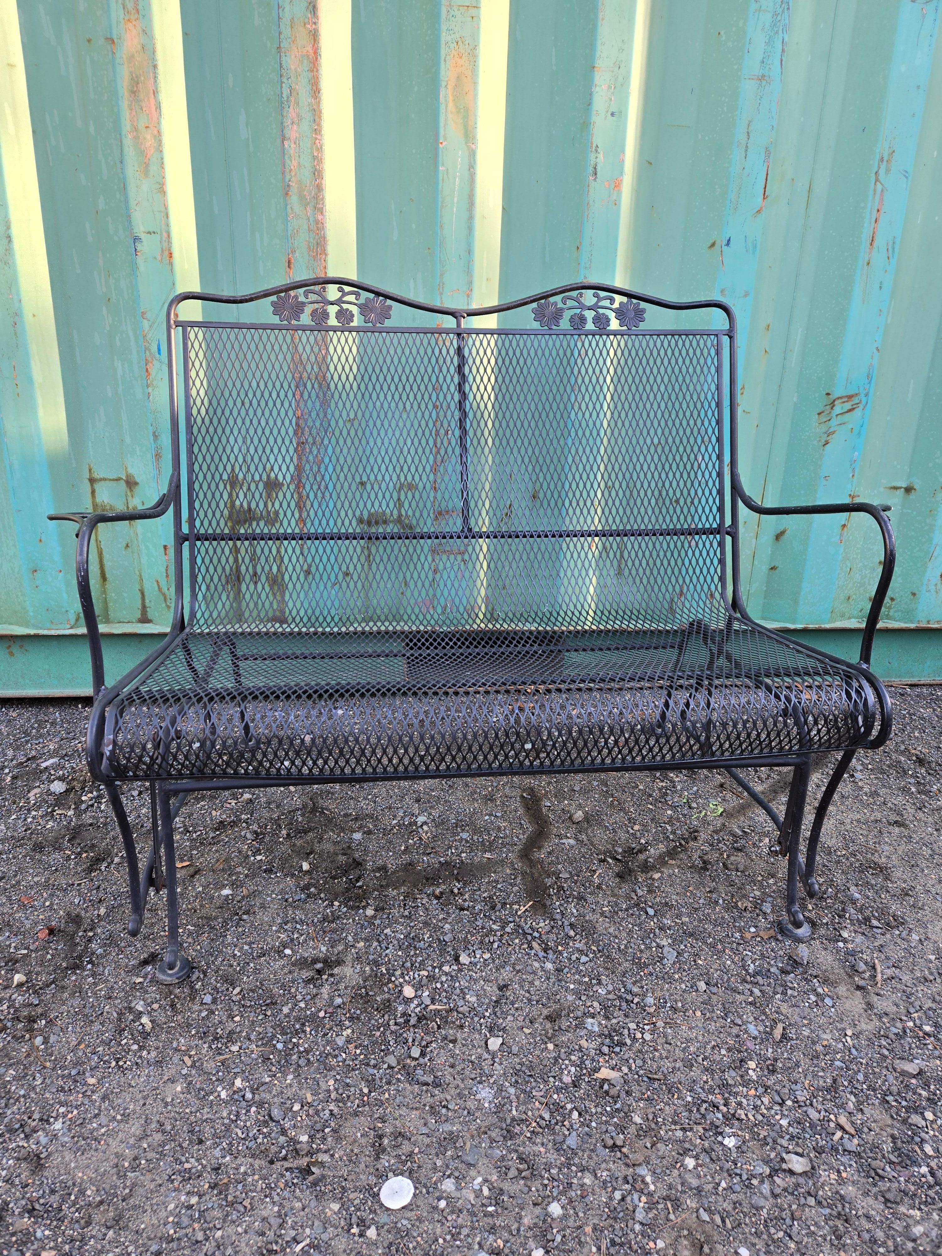 Available now for your enjoyment and ready to ship is a Vintage Wrought Iron Patio Glider by Woodard featuring the Daisy Bouquet Motif.

This lovely Wrought Iron Glider is the perfect addition to any garden, terrace, or veranda. Enjoy a glass of