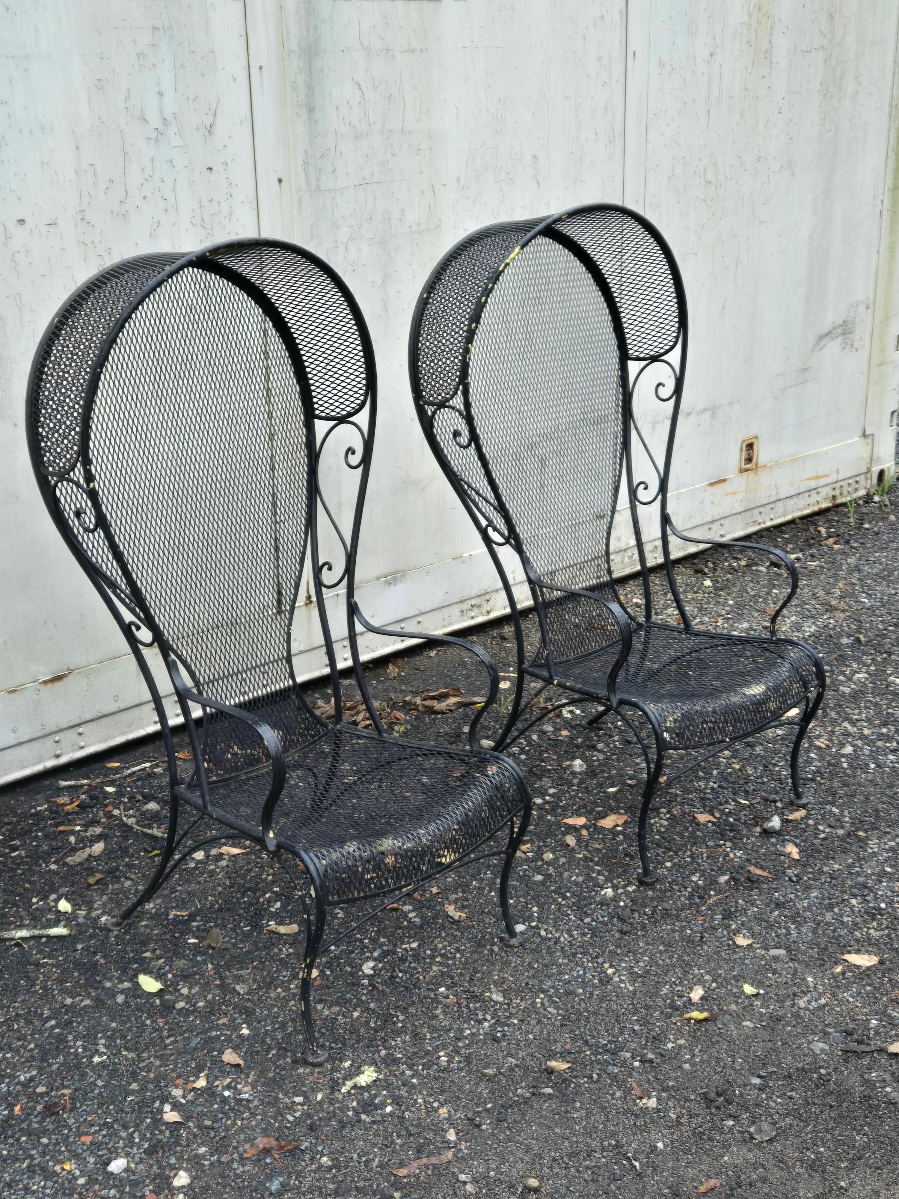 Available now for your enjoyment and ready to ship is a pair of Vintage Wrought Iron Patio Canopy Chairs by Woodard featuring the sculptura style.

This lovely Wrought Iron pair of Canopy Throne Chairs are the perfect addition to any garden,