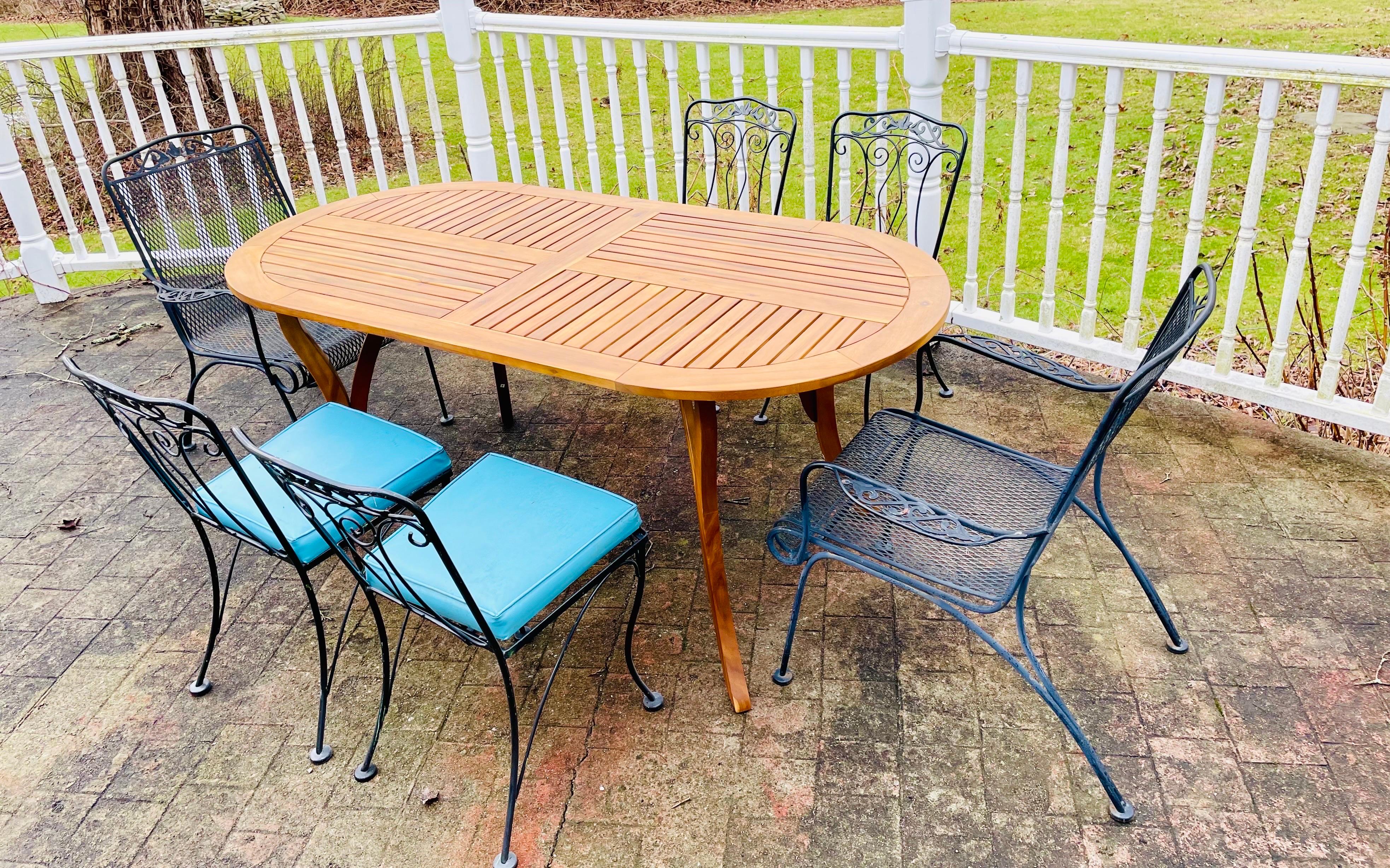 Vintage wrought iron patio furniture seating chairs with teak table

No matter what your style – mid century modern, rustic, traditional, or farmhouse– you can create this stylish and trending look by mixing wood and metal. 

This set features 6