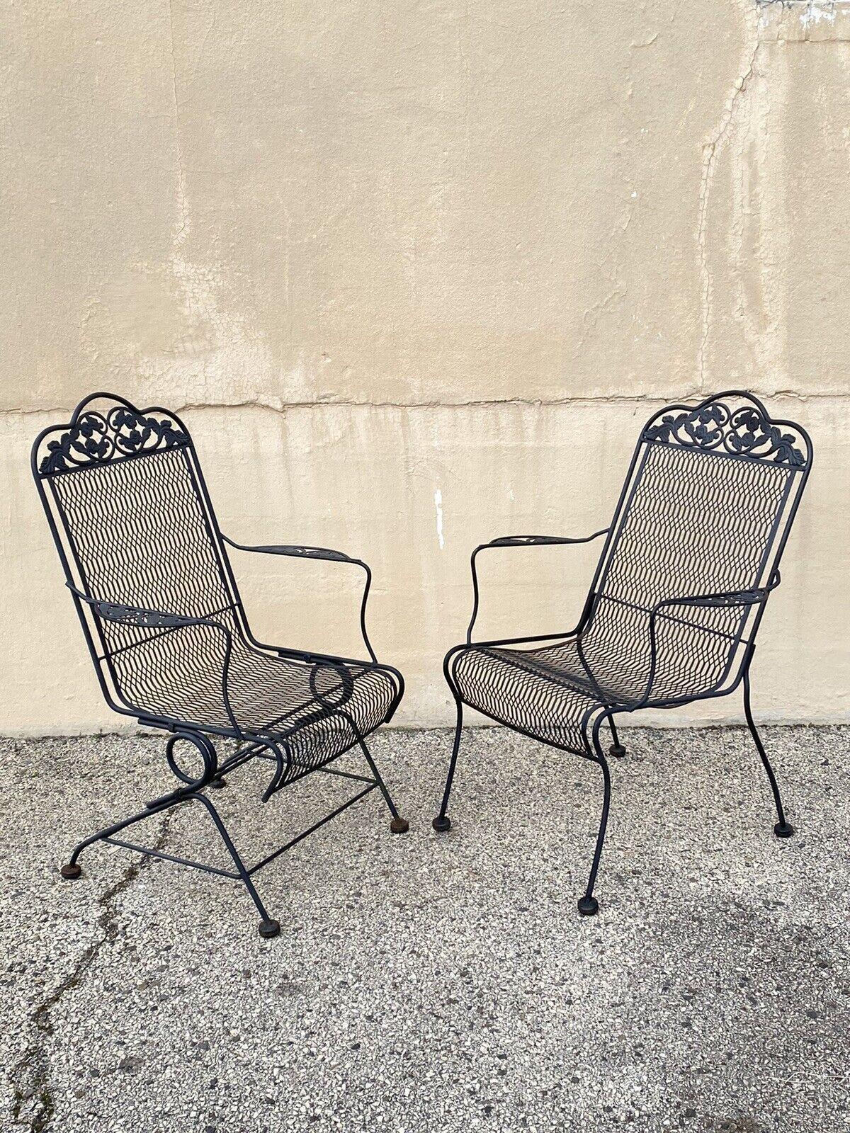 Vintage Wrought Iron Rose and Vine Pattern Garden Patio Chairs - 7 Pc Set. Item features 2 straight arm chairs, 4 spring / bouncer arm chairs, one bouncer chaise lounge chair. Circa Late 20th to 21st Century, Pre-owned.
Measurements: 
(2) Straight