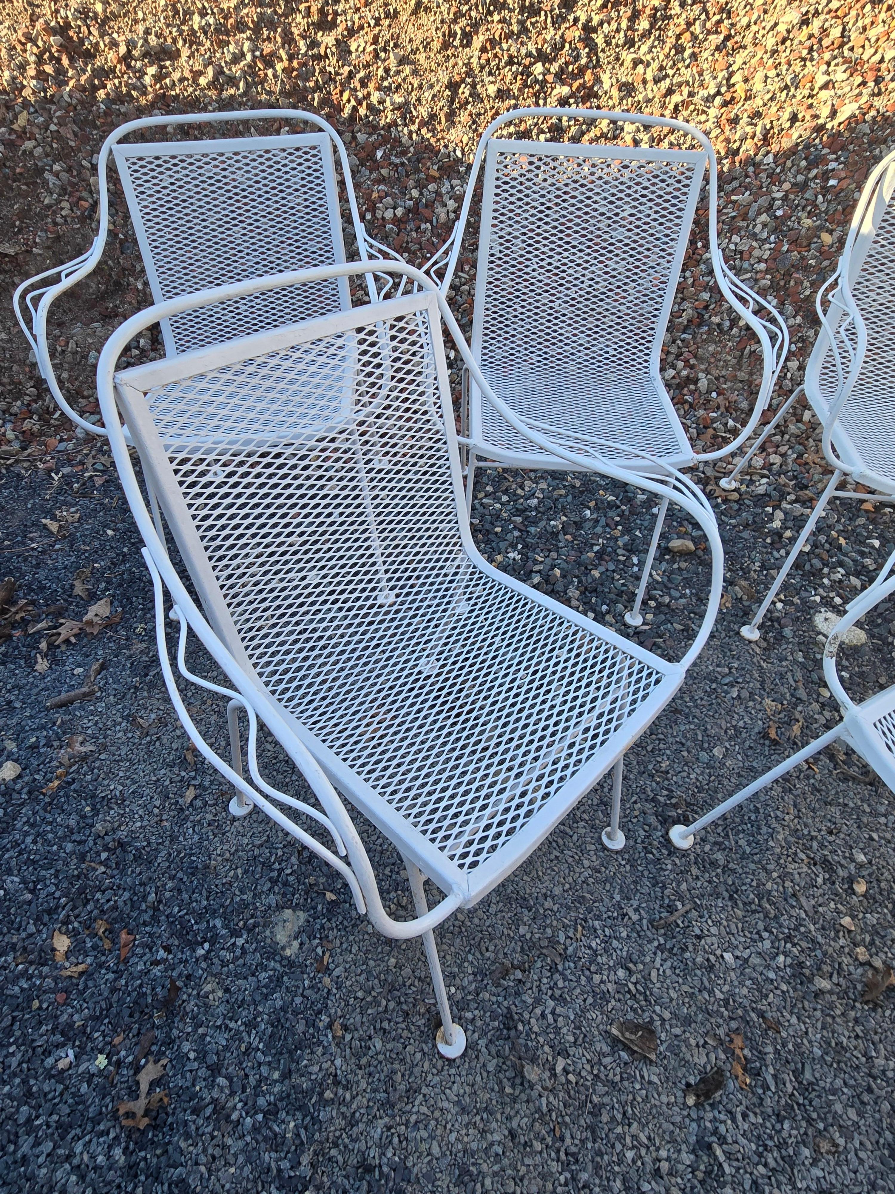 Available now for your enjoyment and ready to ship is a Set of 6 Vintage Wrought Iron Patio Chairs.

Add some Mid-Century charm to your patio with this vintage six-piece wrought iron lounge set from Woodard. The set includes six chairs, each with a