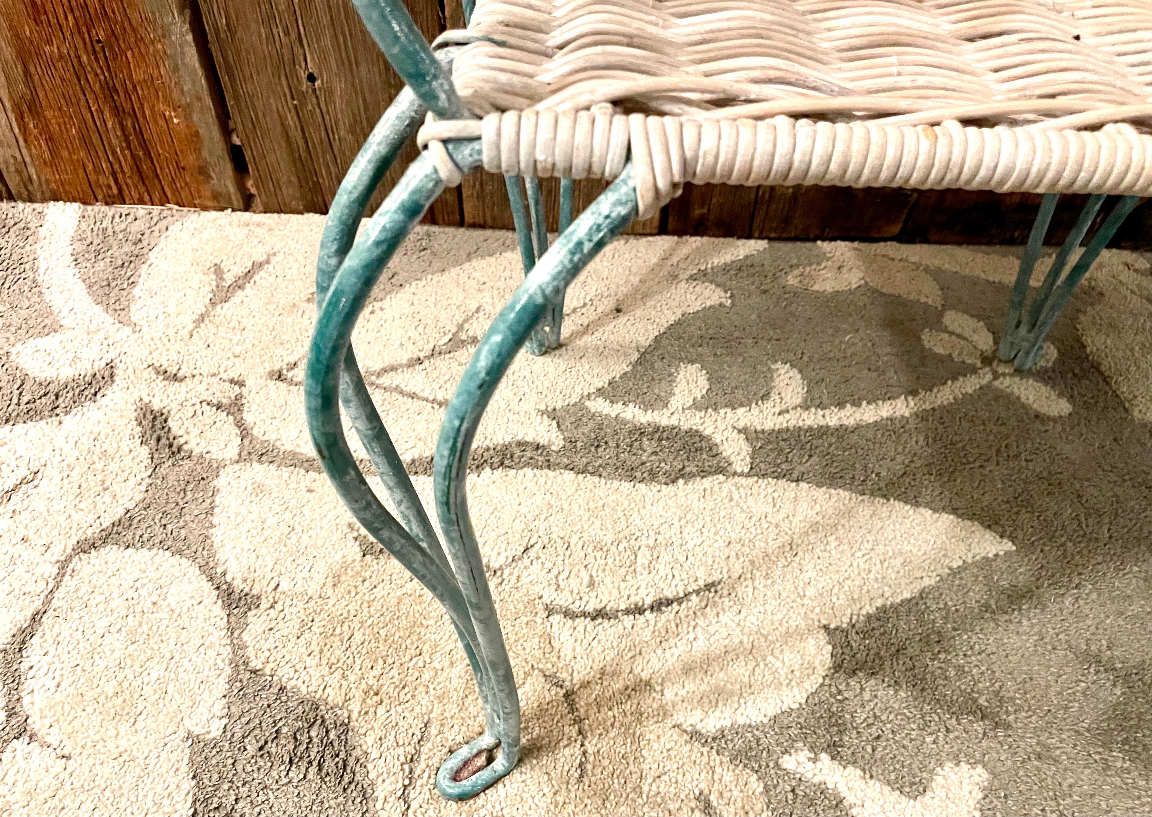 Available now and ready to ship is a 
vintage wrought iron seating antique teal shell arm chair.

Beautiful in tact and flaw free wicker with wrought iron bursting sea shell in teal. Fabulous addition to any beach house or Nautical theme. Perfect