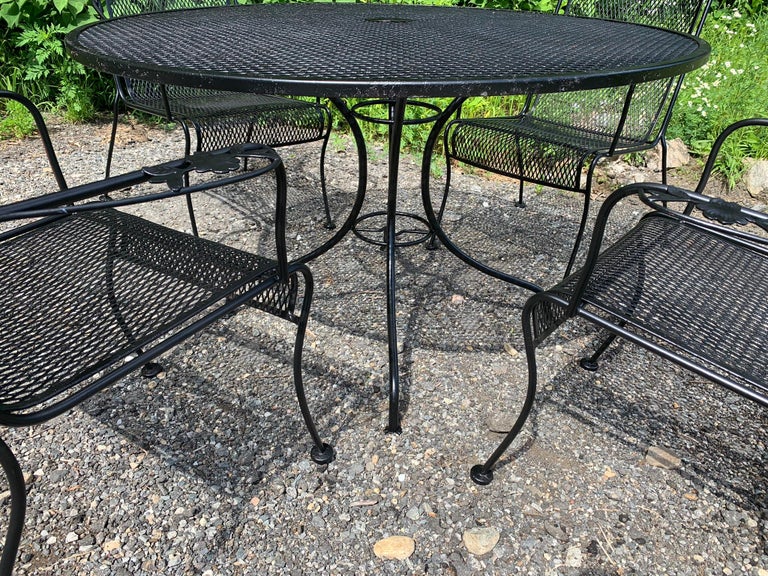 Wrought iron table with 4 chairs hot sale