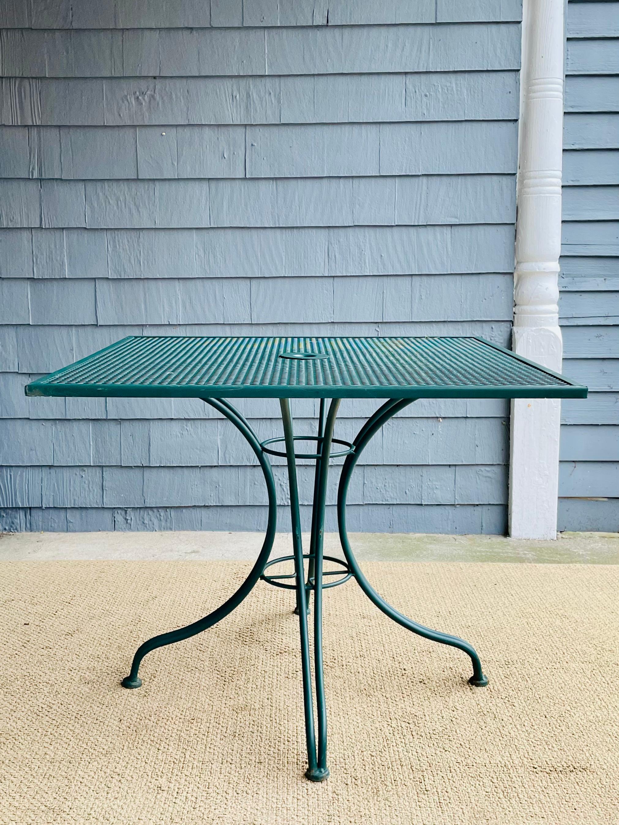 Available now for your enjoyment and ready to ship is a Vintage Wrought Iron Square Outdoor Patio Table. 

This lovely Wrought Iron Patio Table is the perfect addition to any garden, terrace, or veranda. Enjoy a glass of lemonade in the late