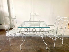Vintage Wrought Iron Table and Armchairs in the Manner of Giacometti