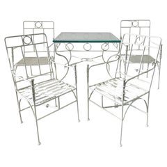 Vintage Wrought Iron Table and Armchairs in the Manner of Giacometti