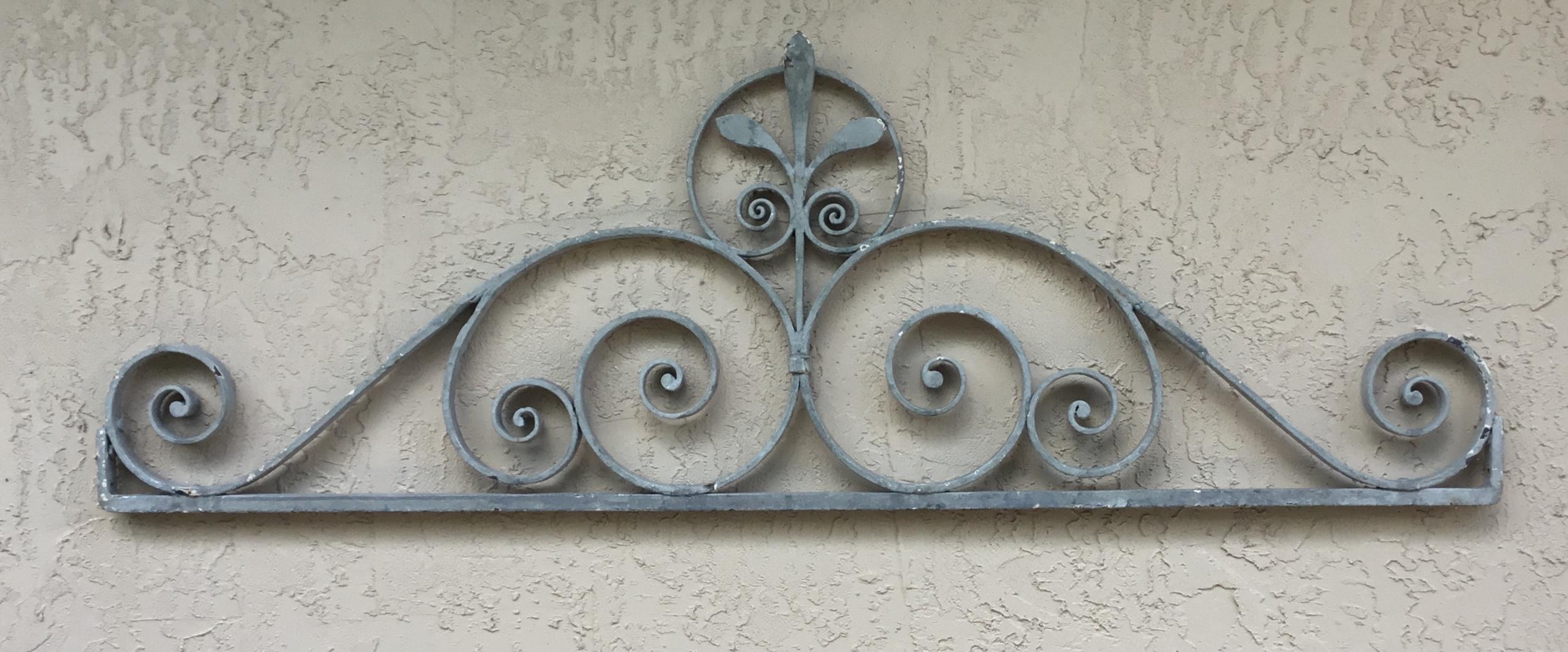 Architectural wall hanging made of solid wrought iron, painted in grey color. Will look great overhead entrance, door or just as architectural wall hanging.