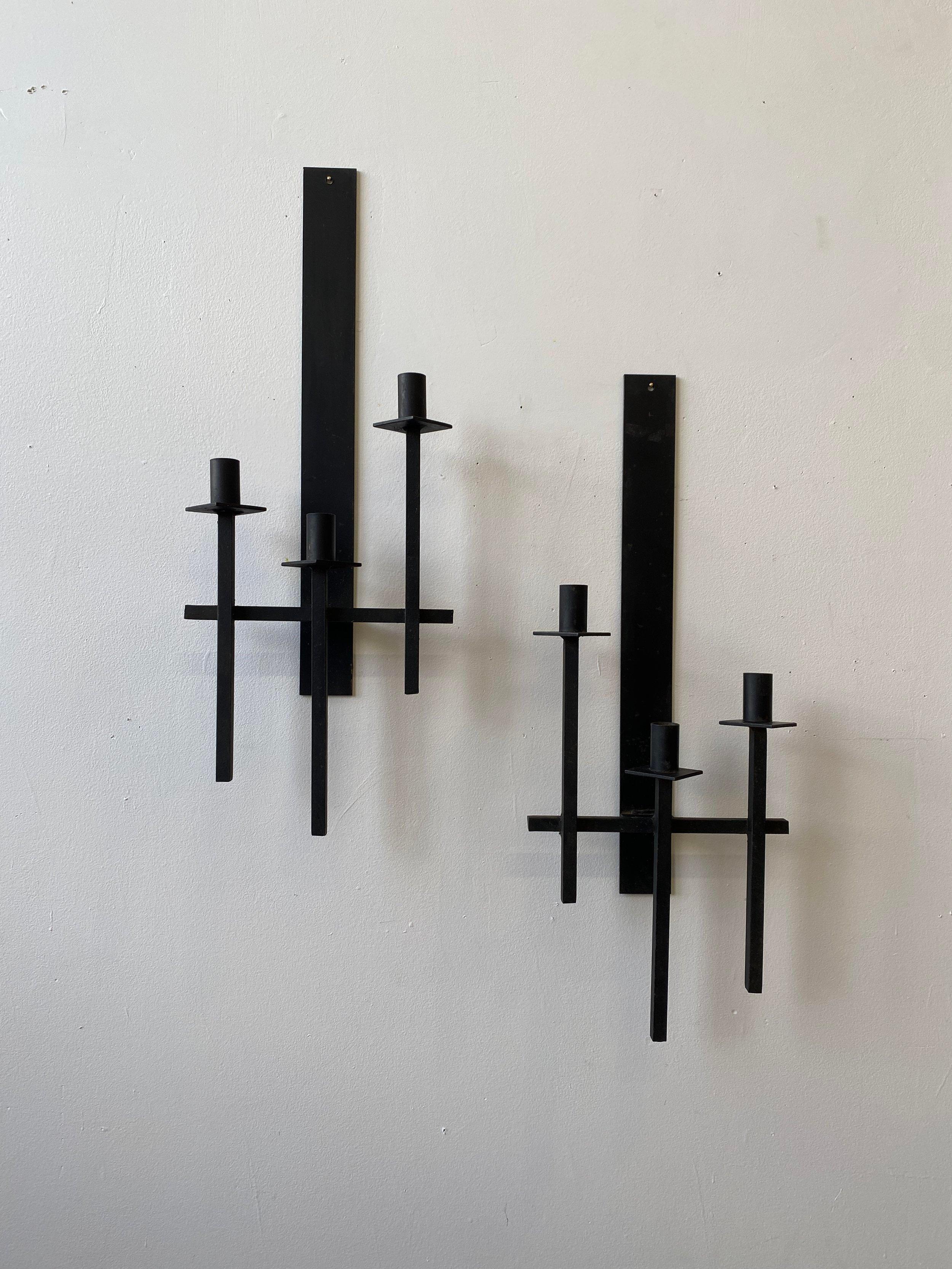 Vintage Wrought Iron Candelabra Wall Sconces by Van Keppel-Green, A Pair, Circa 1960s. Brutalist in design, these wall sconces are formed from square-cut rods of wrought iron. Each piece holds 3 candles staggered along the frame. Unsigned.

“Van