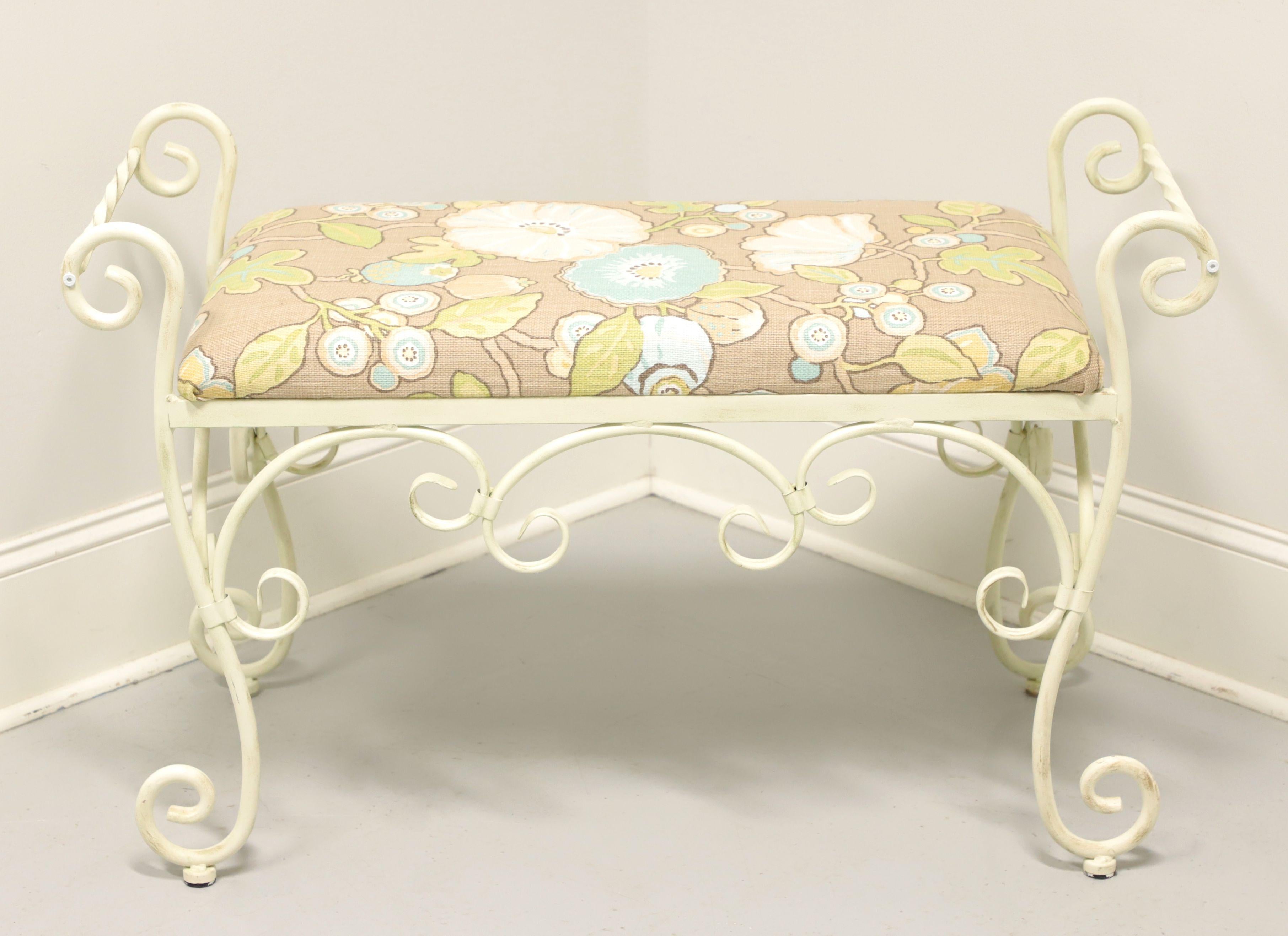 A vanity bench with an Italian style by L. Powell Company, of Culver City, California, USA. Wrought iron painted white with a neutral floral pattern fabric upholstered seat. Features a graceful curved design with turned side handles. Made in the