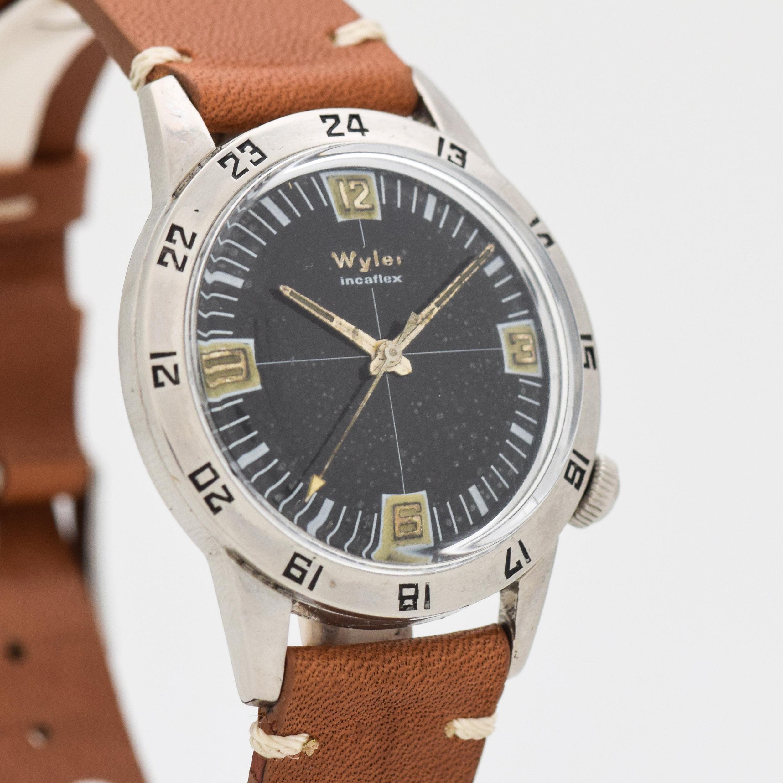 1976 Vintage Wyler Incaflex Ref. 1976-1162D Stainless Steel watch with Original Black Dial with Raised 3, 6, 9. and 12 O'clock Gold Markers. Case size, 35mm x 42mm lug to lug (1.38 in. x 1.65 in.) - Powered by a 17-jewel, manual caliber movement.