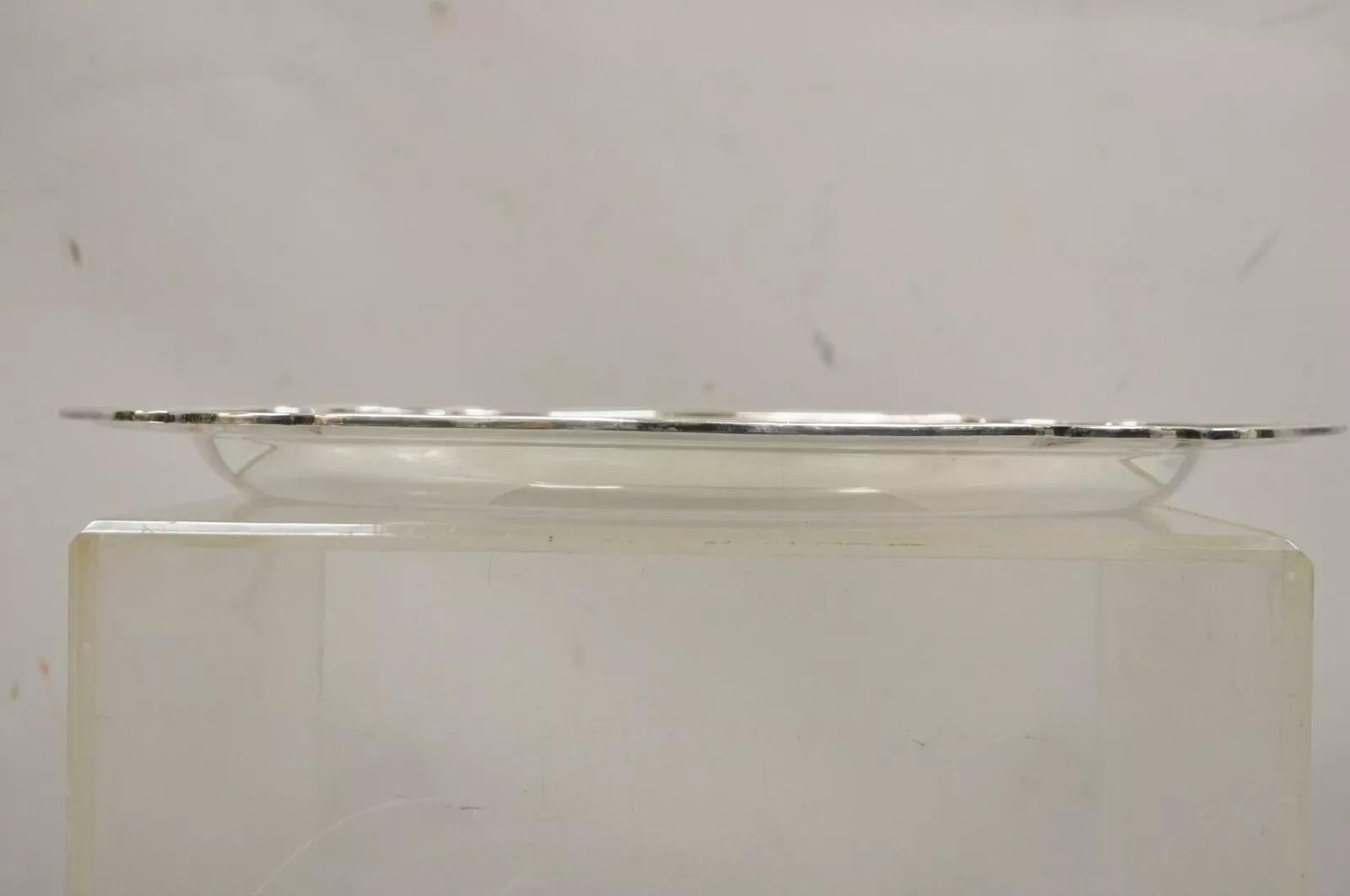 Bandeja ovalada honda de servir con baño de plata de la época eduardiana inglesa Wyler NY. Mediados del siglo XX. Medidas: 1,5