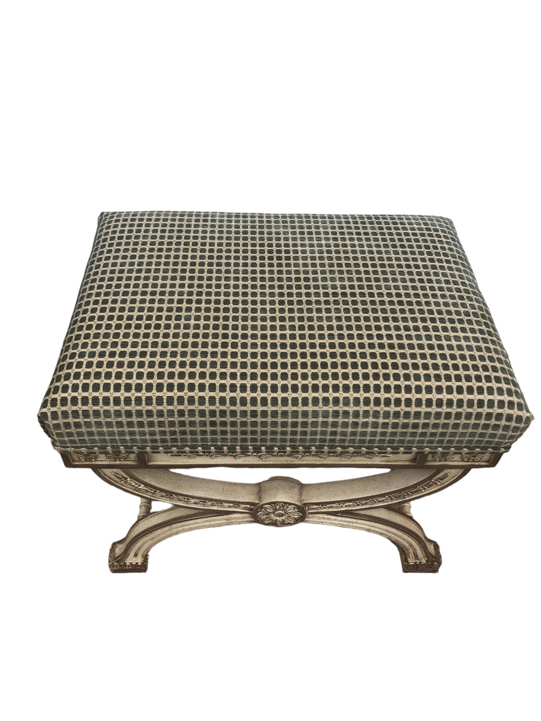 Vintage X Form Regency Style Upholstered Bench. Painted in a cream white finish with silver accents. Newly upholstered in a velvet checkered fabric. 