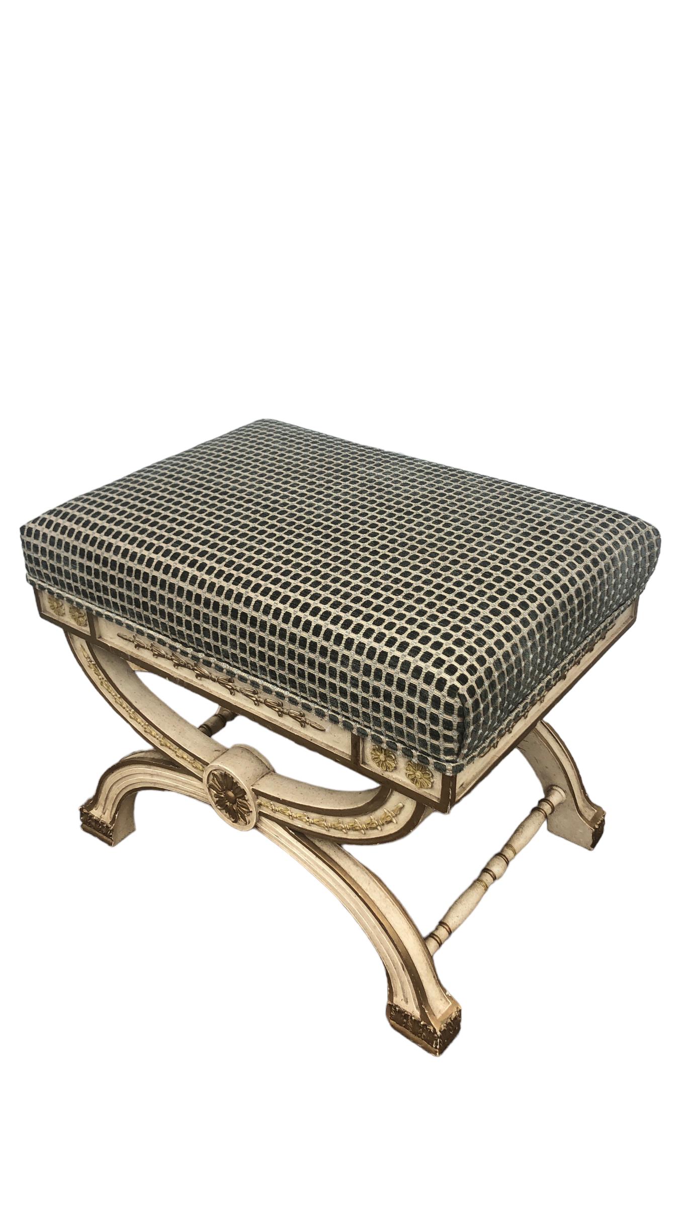 Vintage X Form Regency Style Upholstered Bench. Painted in a cream white finish with gold accents. Newly upholstered in a velvet checkered fabric. 