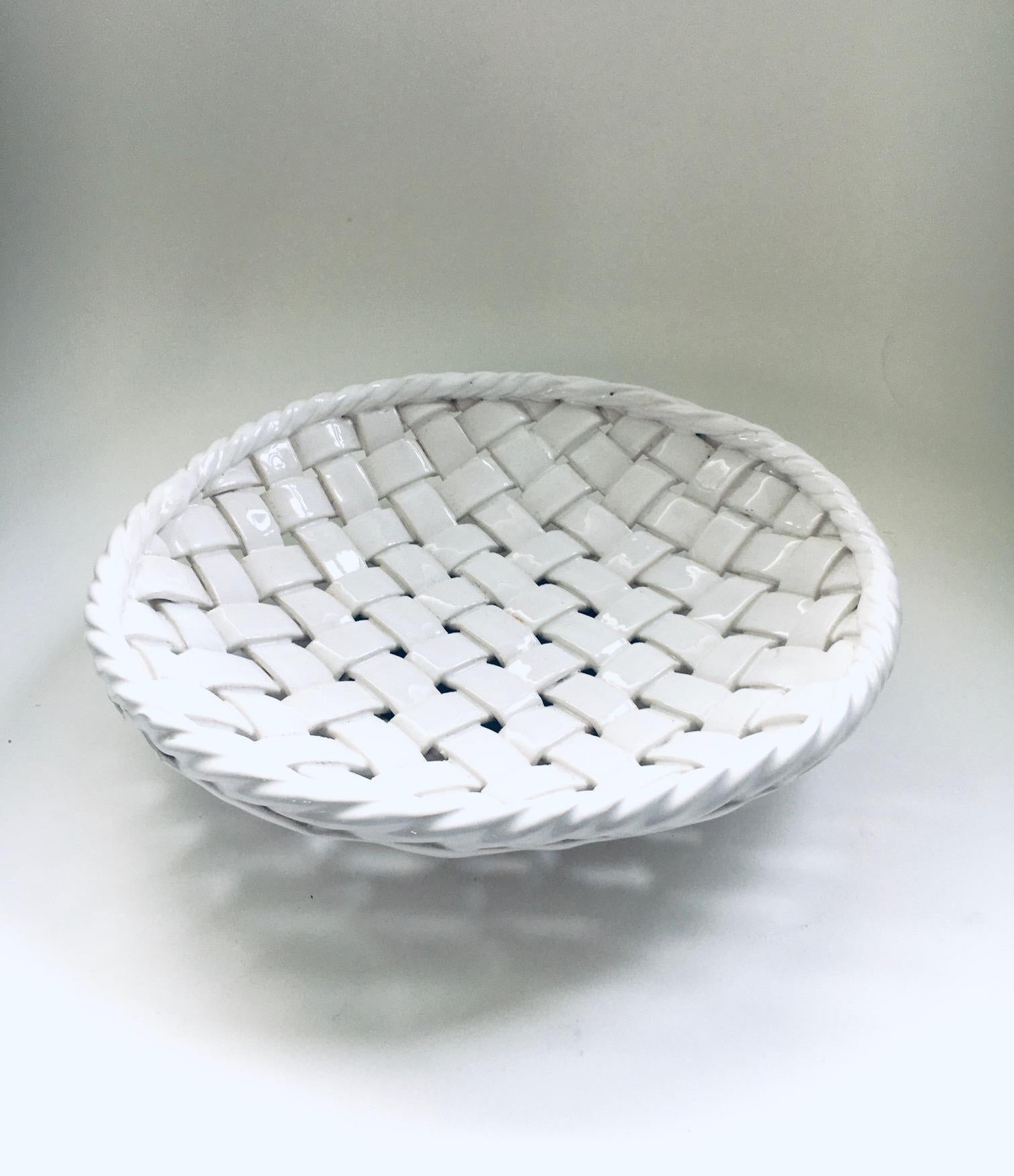 Vintage Hand Made White Braided Ceramic XL Fruit Bowl. Made in France, 1960's period. Basketweave woven earthenware white glazed bowl with twisted border. Comes in very good condition. Measures 7cm x 32cm x 32cm.
