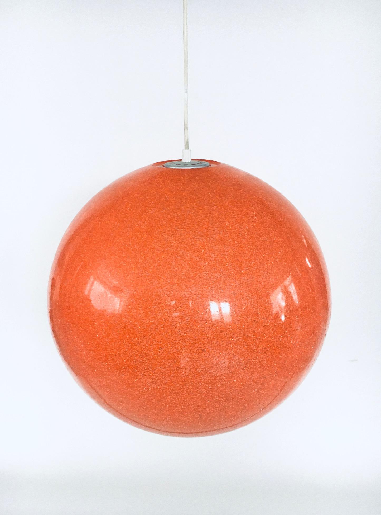 Vintage XL Spherical Orange Resin Pendant Hanging Lamp. Made in Italy, 1960's. No maker markings. In the style of the sugarball lamps by Erco or by Rotaflex. XL orange resin sugarball plastic with smooth outer surface ball lamp. Very large and rare