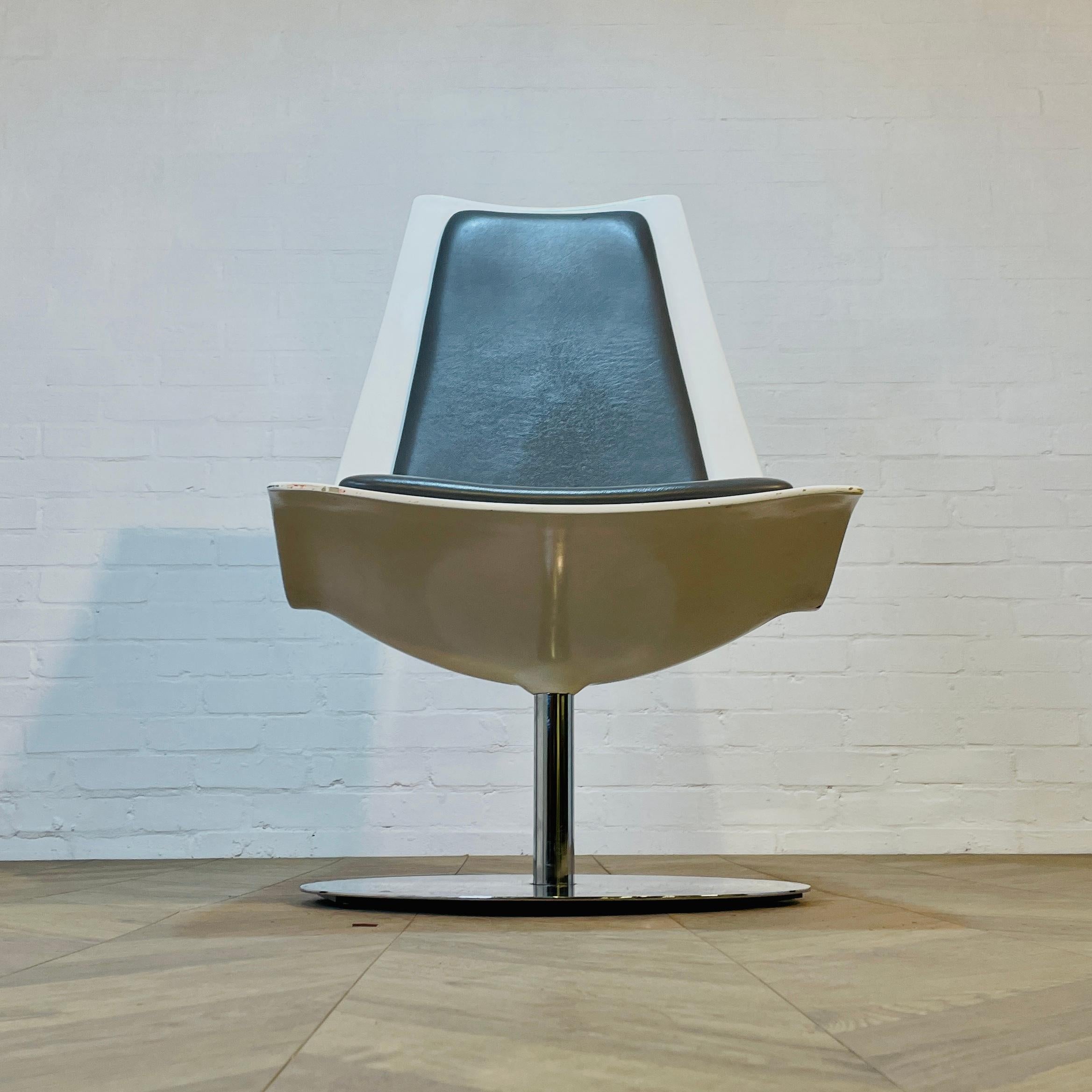 Vintage XPO Swivel Chair by BO Concept on Chrome Base.

The chair, which is super heavy, boasts faux grey leather seat pads and a white hard shell, which is in good vintage condition, with slight marks and scuffs to the frame, in-keeping with their