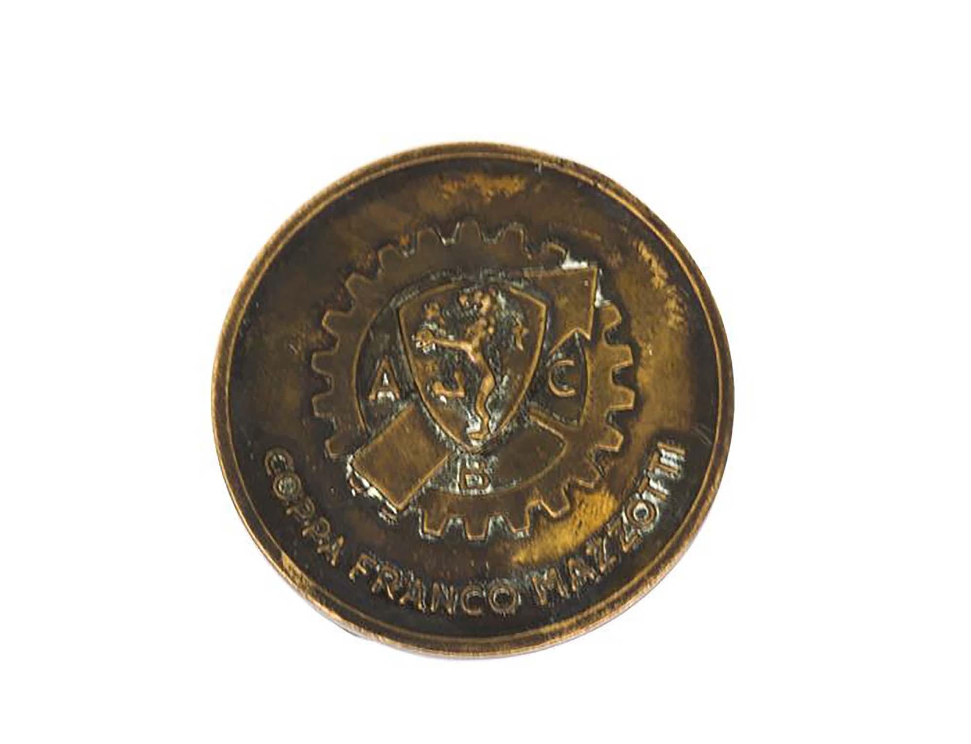 Vintage XVIII Mille Miglia bronze badge medal coin
Made in Italy, 1951

The Mille Miglia was an open-road, motorsport endurance race established in 1927 by the young Counts Francesco Mazzotti and Aymo Maggi, which took place in Italy twenty-four
