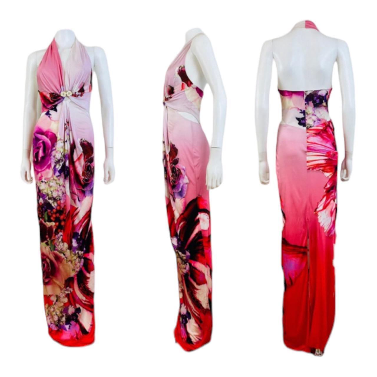 Stunning Roberto Cavalli Dress
Super bold oversized dramatic floral print on slinky viscose fabric
Roberto Cavalli signature appears in several spots throughout the dress
Halter neckline slips overhead
Plunging bodice with cream enamel flowers on