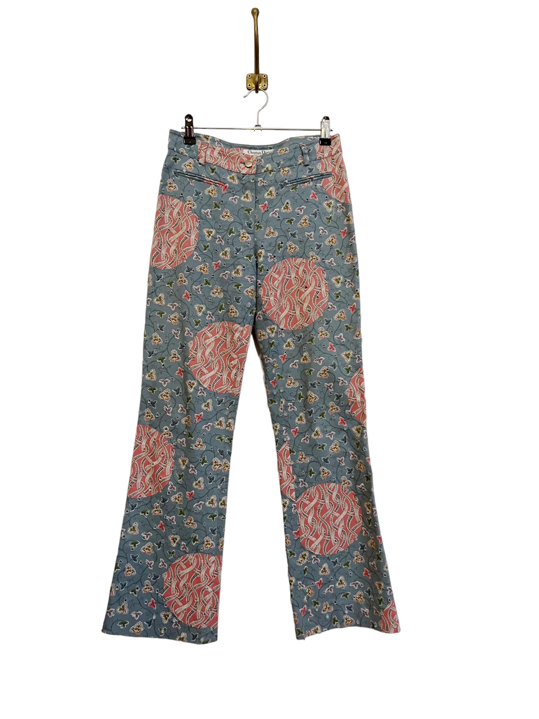 Y2k Galliano era Christian Dior Pants in a beautiful blossom patterned fabric with a perforated distressed style texture. 

MADE IN FRANCE 

Features: 
Button / Zip fasten
2 Front pockets
Low Rise 
Belt Loops

98% Cotton 
2% Lycra 

Sizing:  
Waist: