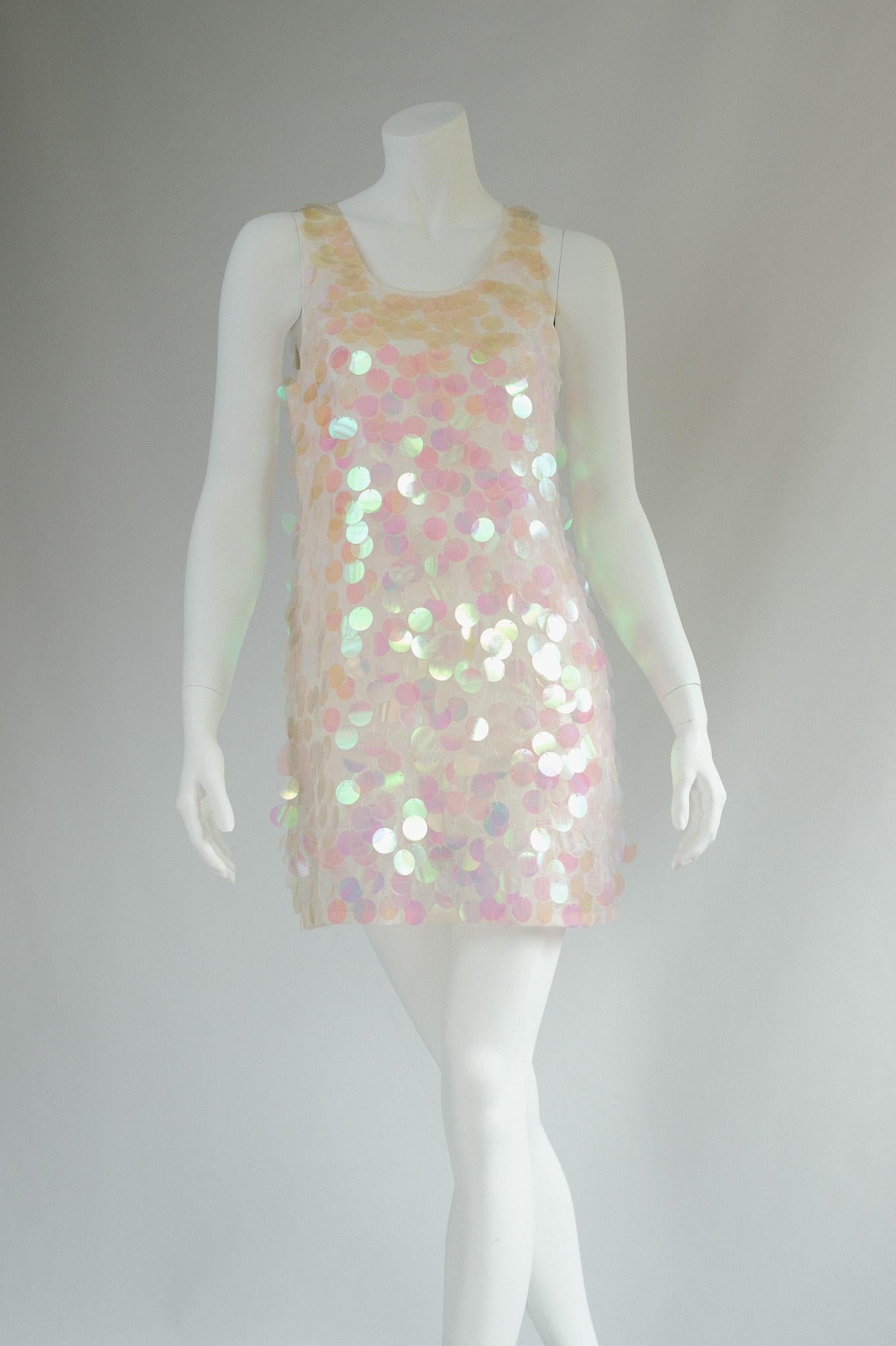 Vintage y2K Miu Miu Sequined Mini shift Dress

This dress is a timeless piece that will add a touch of archival elegance to any wardrobe.

Don't miss your chance to own this stunning vintage Chloe dress!

So fun. Let all your disco dreams come