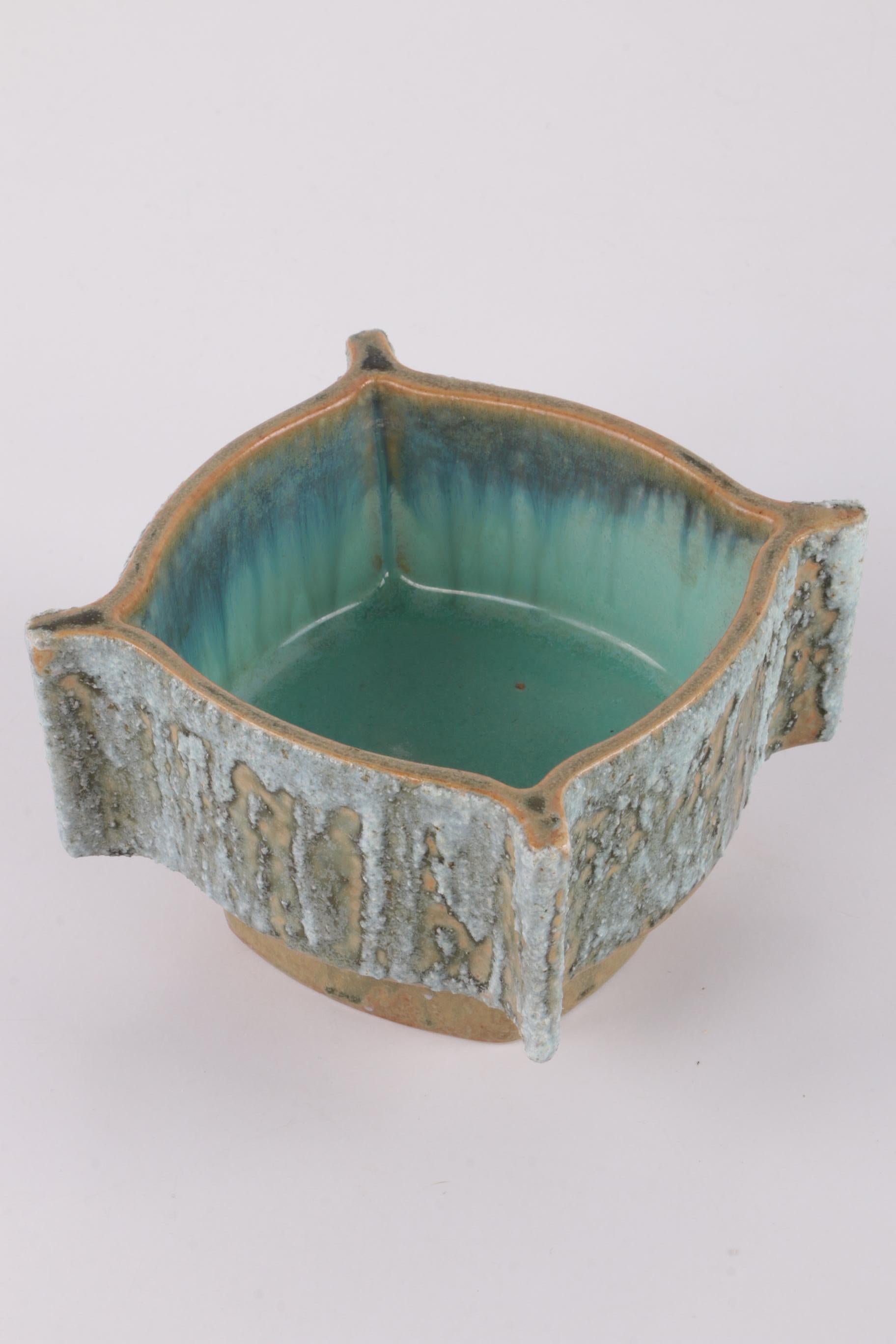 Vintage Yamasan Ikebana bowl beautiful ceramics from Japan 1960s


Vintage Ikebana bowl from Yamasan.

The glaze has a rich light blue color and resembles highly grained tree bark.

Ikebana is the art of Japanese flower arranging and this