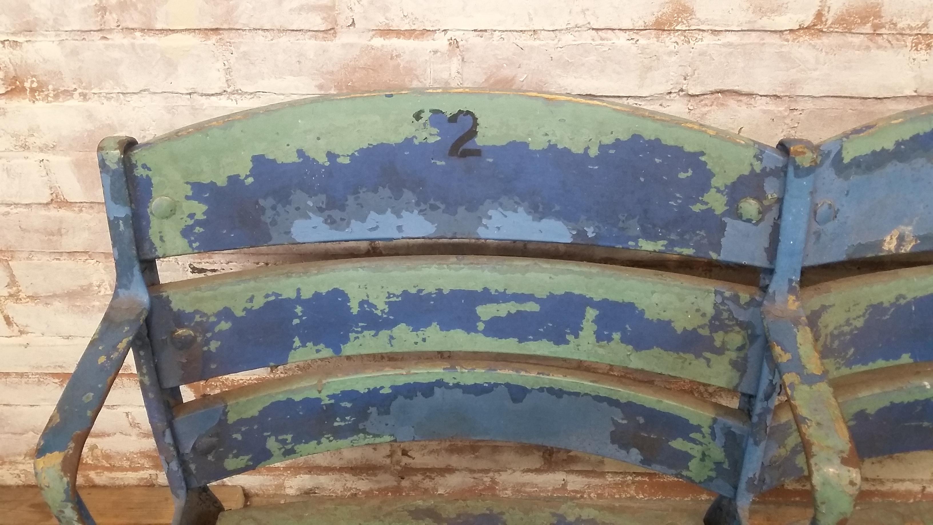 Authentic set of 2 Yankee Stadium seats, circa 1920s
Original paint, blue over green paint
Cast iron in good original condition
Has 2 or 3 slats that need to be repaired or replaced.