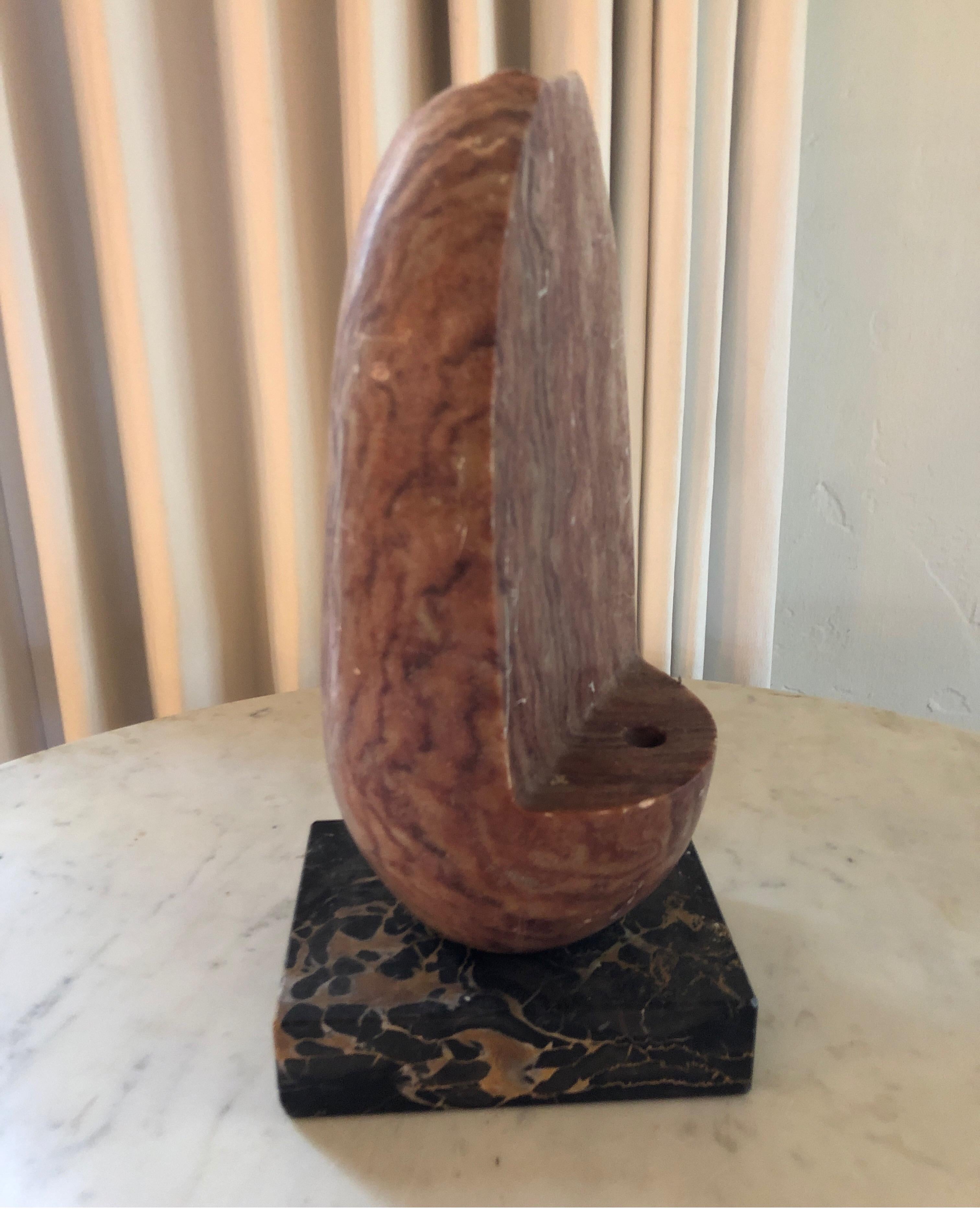 Signed stone sculpture on base.
American Artist Yehuda 