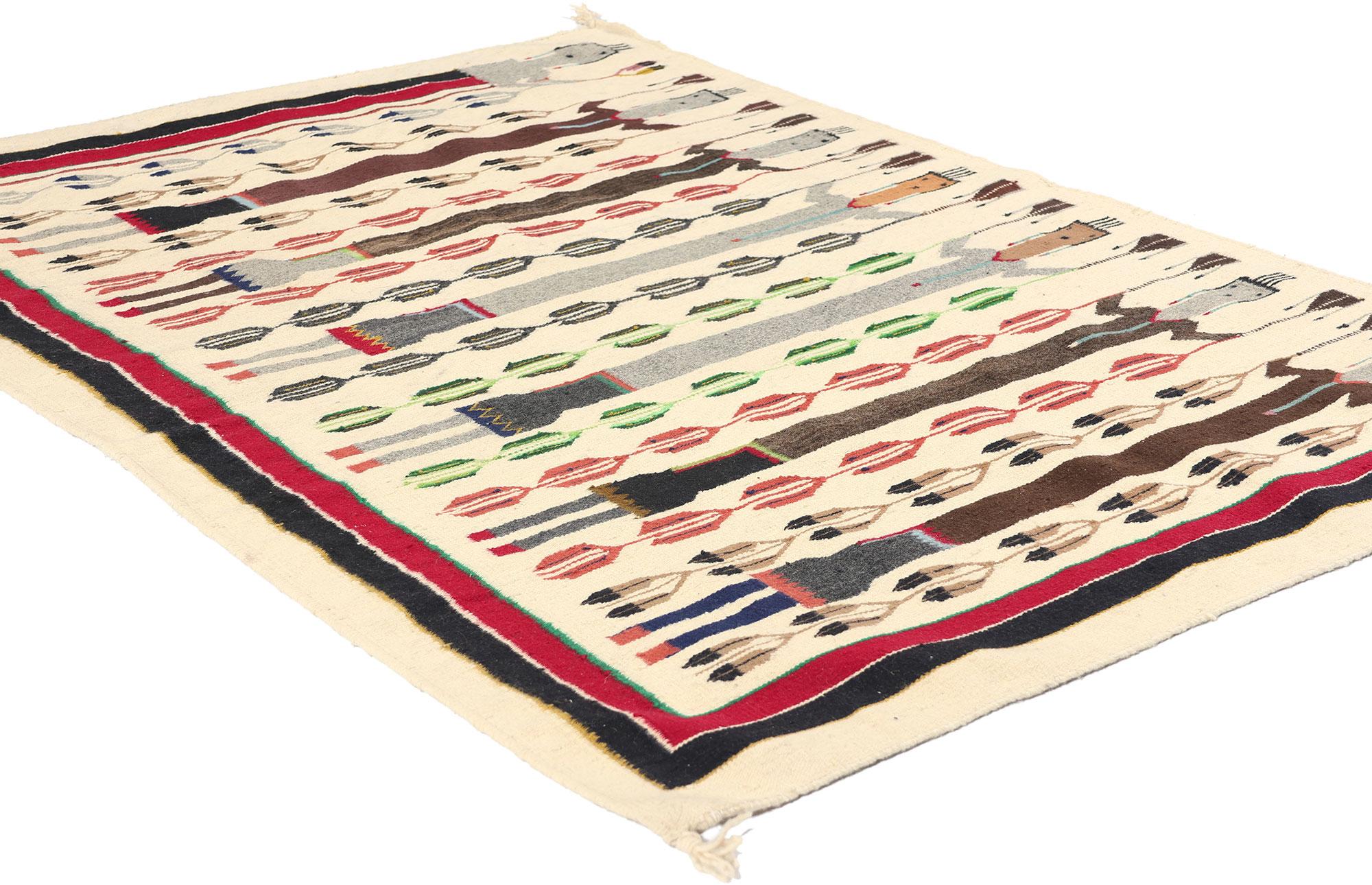 78812 Tappeto vintage Navajo Yeibichai, 03'05 x 04'07. I tappeti Yeibichai Navajo sono tessiture caratteristiche che presentano figure cerimoniali note come Yeis o Yei Bi Chei, che rappresentano divinità o esseri spirituali della mitologia Navajo.