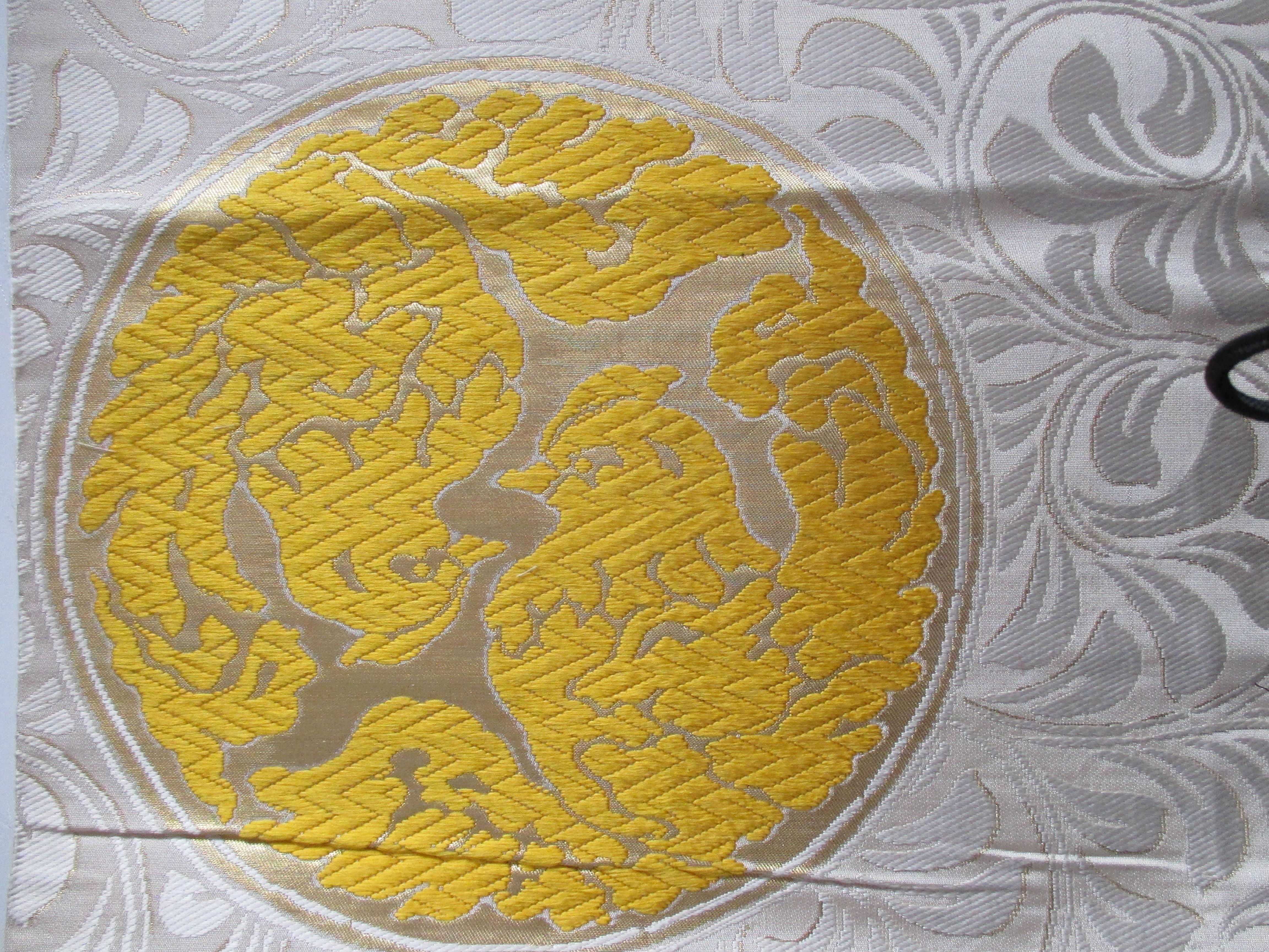 Vintage yellow and green silk obi textile with medallions fragment.
Tone and tone woven floral with embroidered birds and metallic threads.
Ideal for a lumbar pillow.
Fragment panel size is 20.5