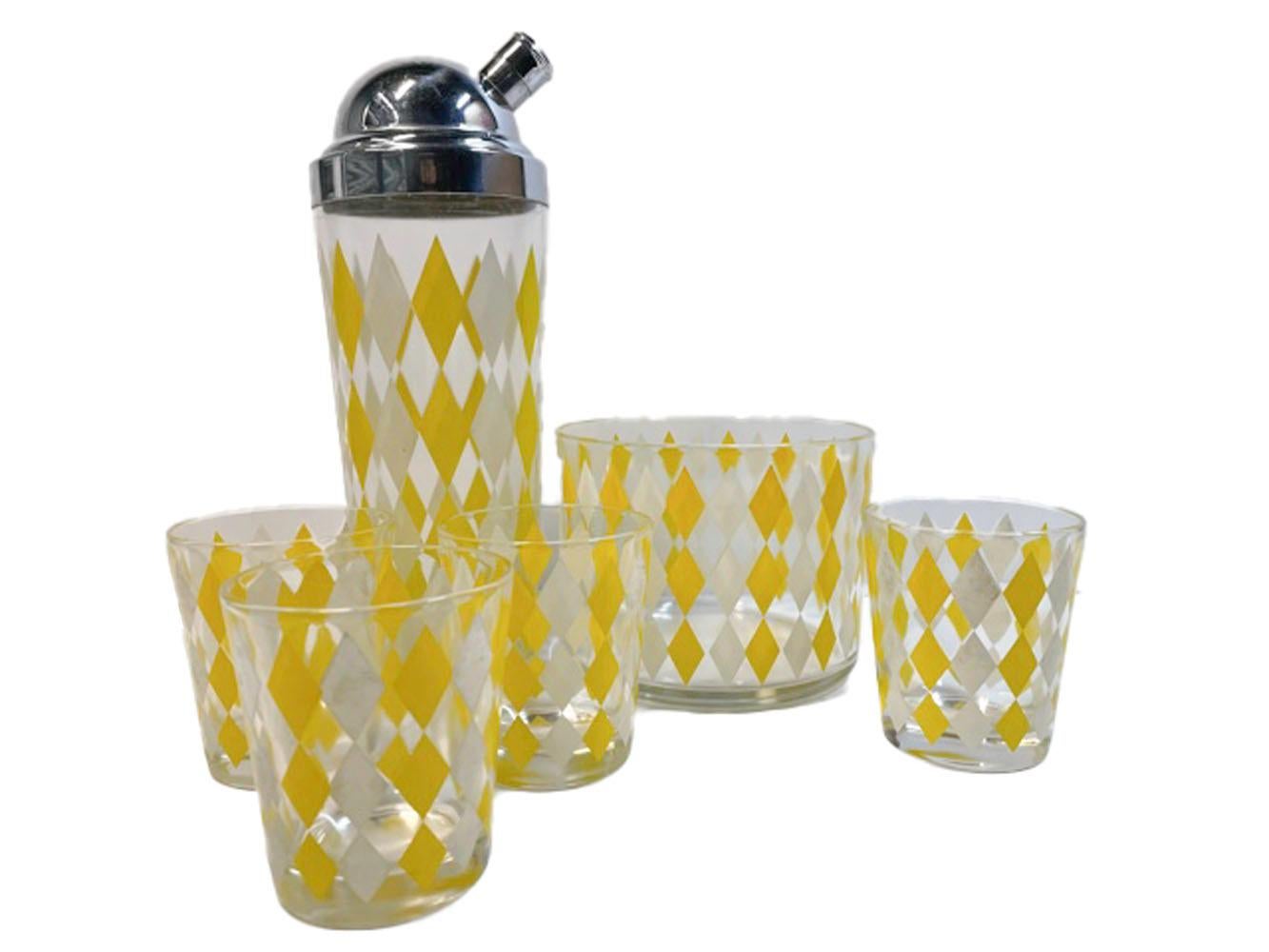 Mid-Century Modern cocktail set with alternating columns of yellow and white diamonds on clear glass.

1 - Cocktail shaker: 10