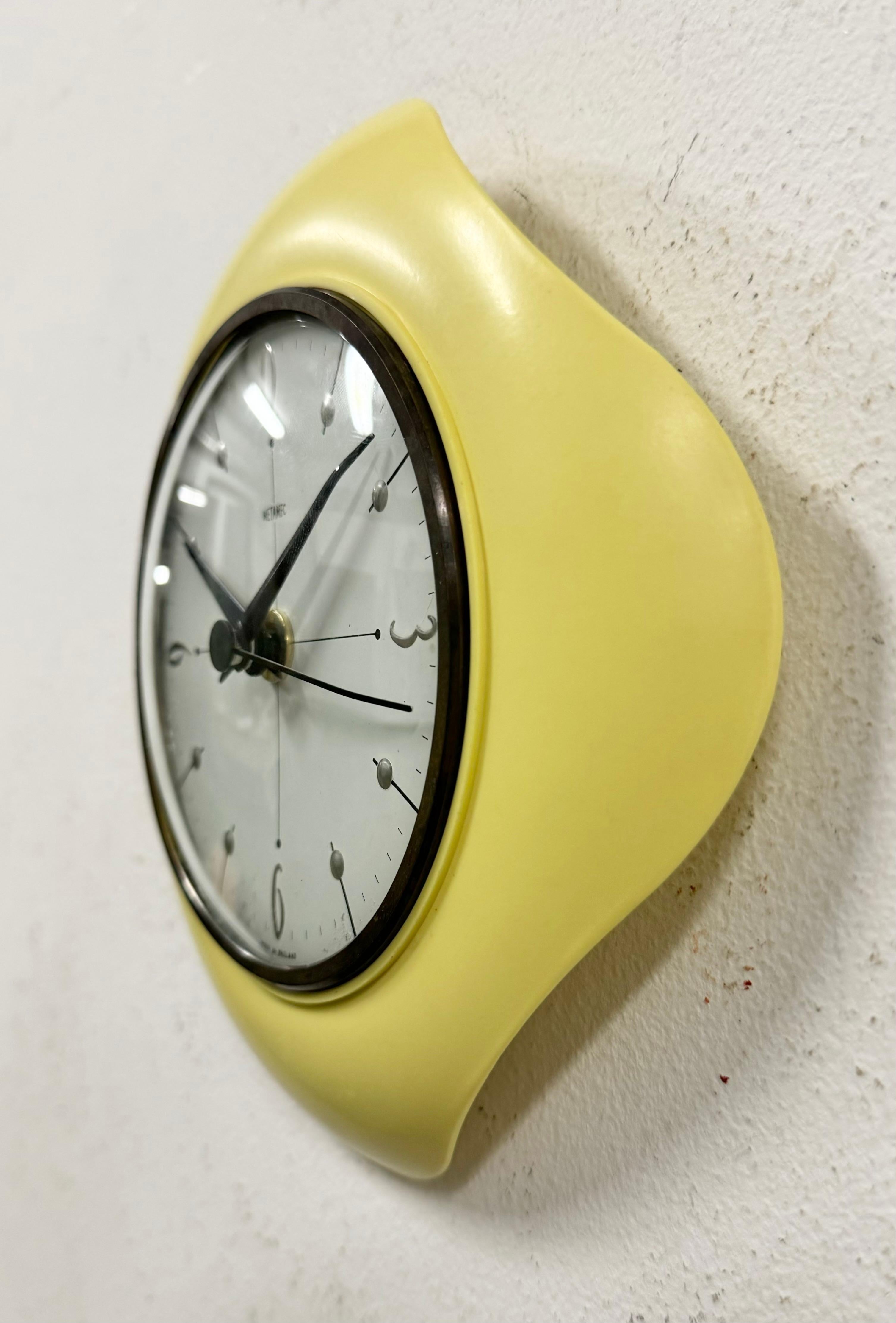 Industrial Vintage Yellow Bakelite Wall Clock from Metamec, 1970s For Sale