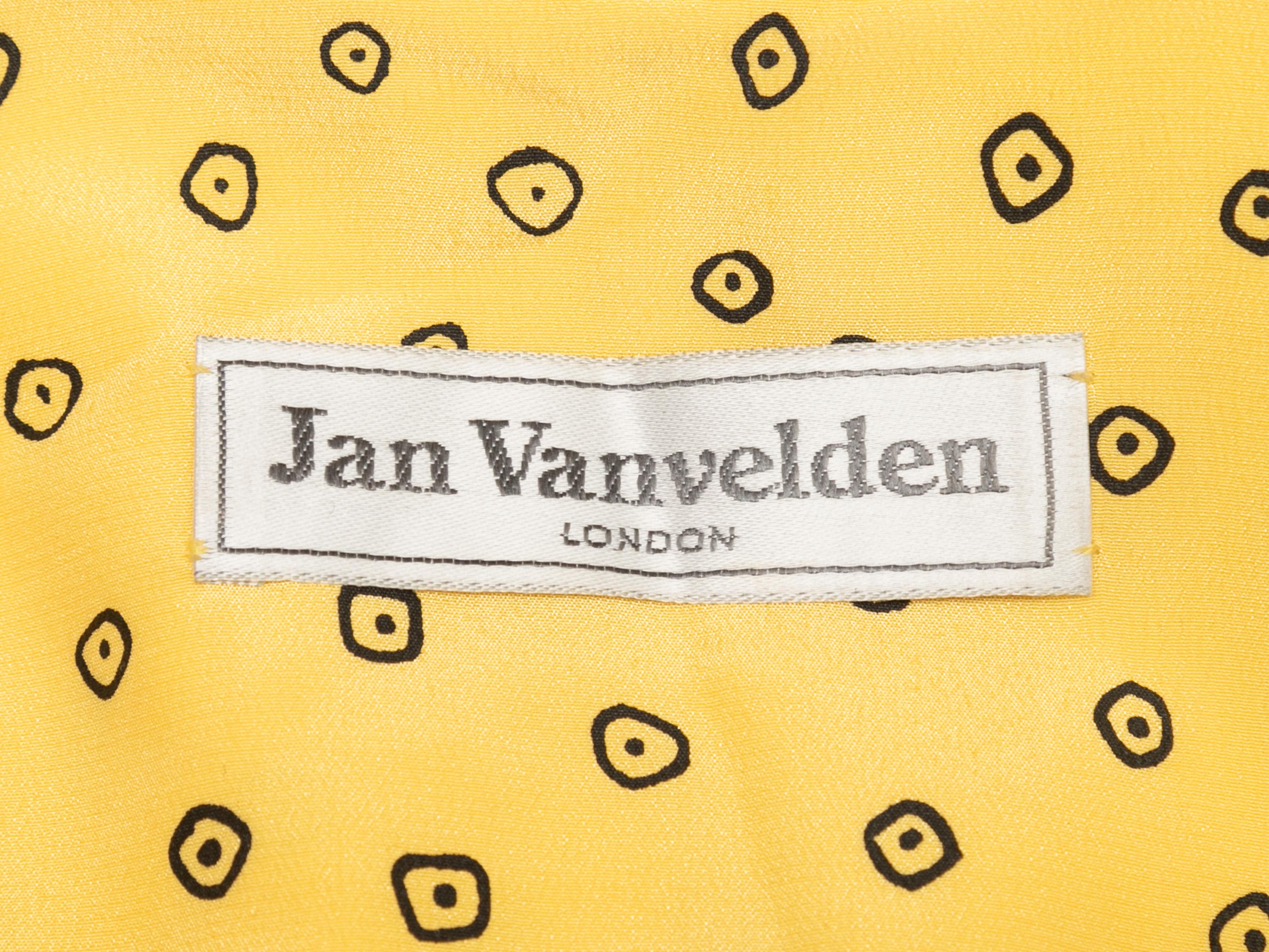Vintage yellow and black silk dot printed blouse by Jan Vanvelden. Pointed collar. Long sleeves. Button closures at center front. 36