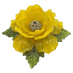 Vintage yellow Celluloid flowers brooch on green leaves, USA 1970s