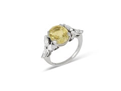 Vintage yellow Ceylon sapphire and diamond ring, circa 1960.