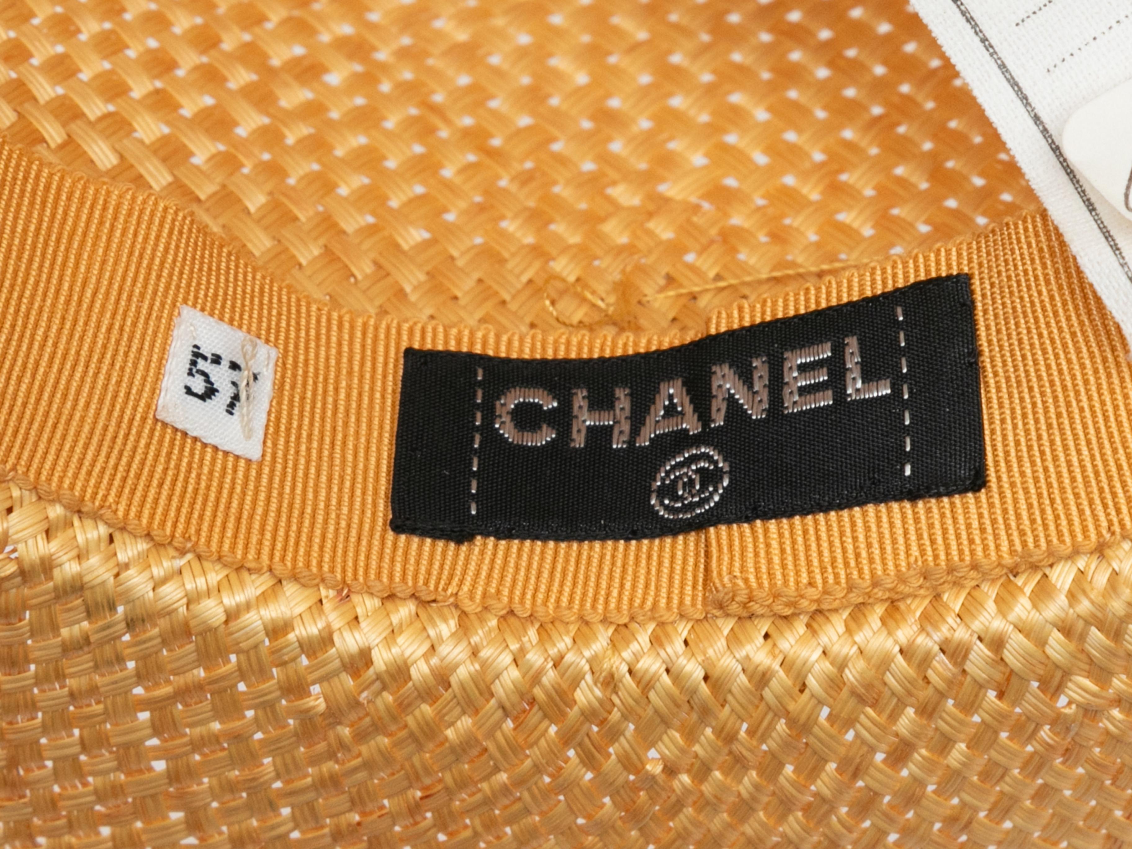 Vintage yellow straw wide brim hat by Chanel. From the Spring/Summer 1988 Collection. Grosgrain ribbon trim. 3