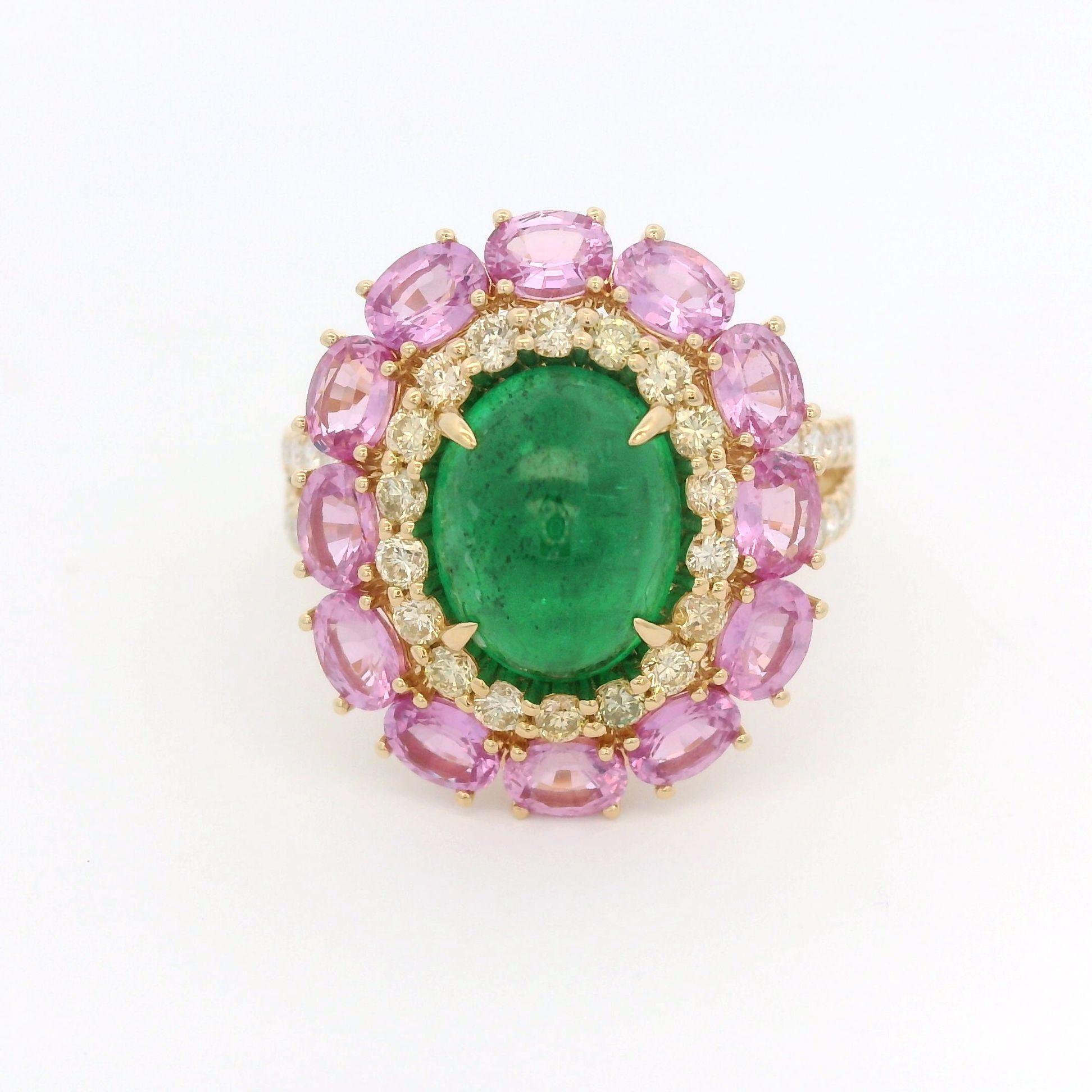 This exquisite 18 karat gold ring, weighing 5.59 grams, is a radiant display of elegance and sophistication. The centerpiece is a vivid 2.53-carat cabochon emerald, celebrated for its deep green hue and captivating allure. Encircling the emerald are